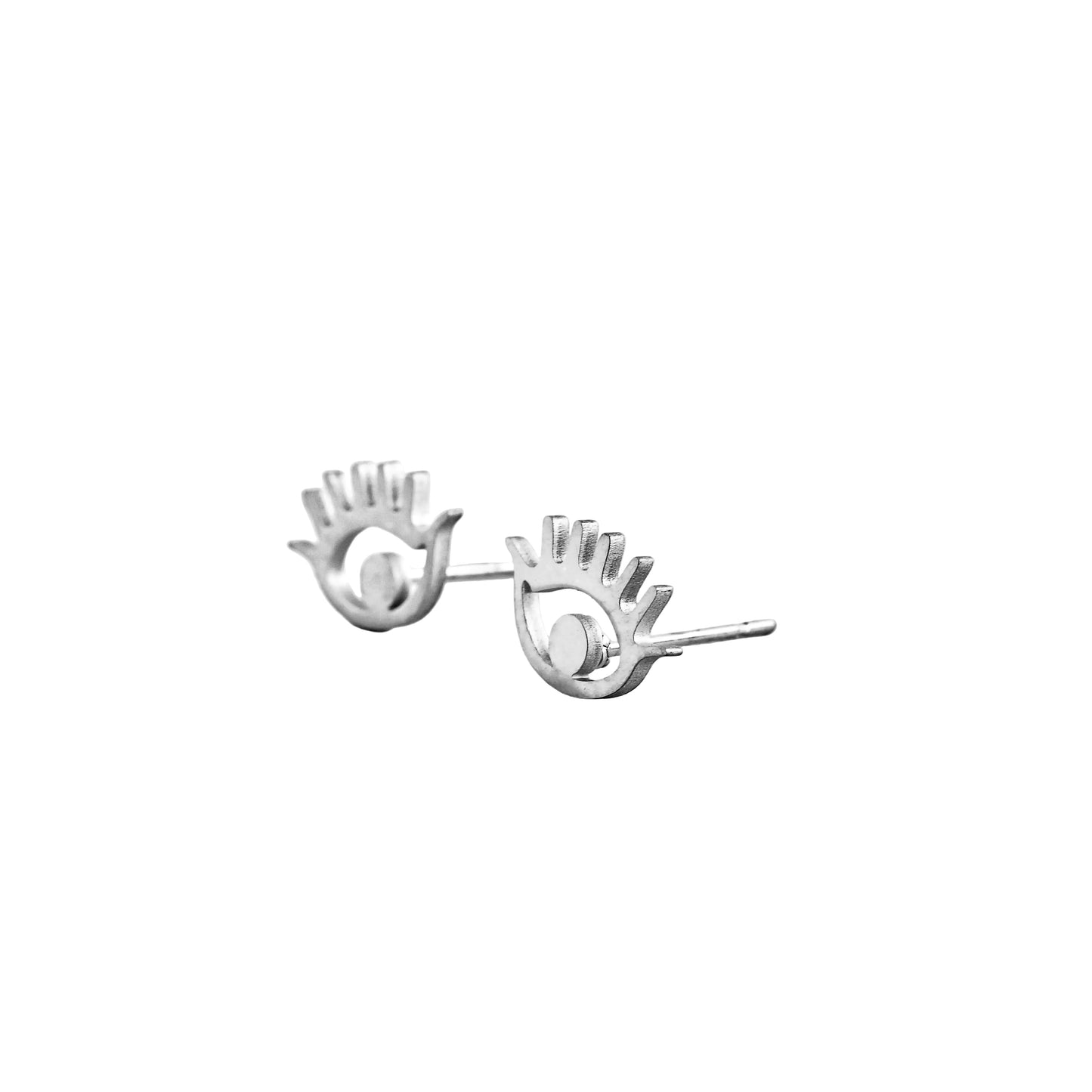 Silver eye stud earrings on a white background