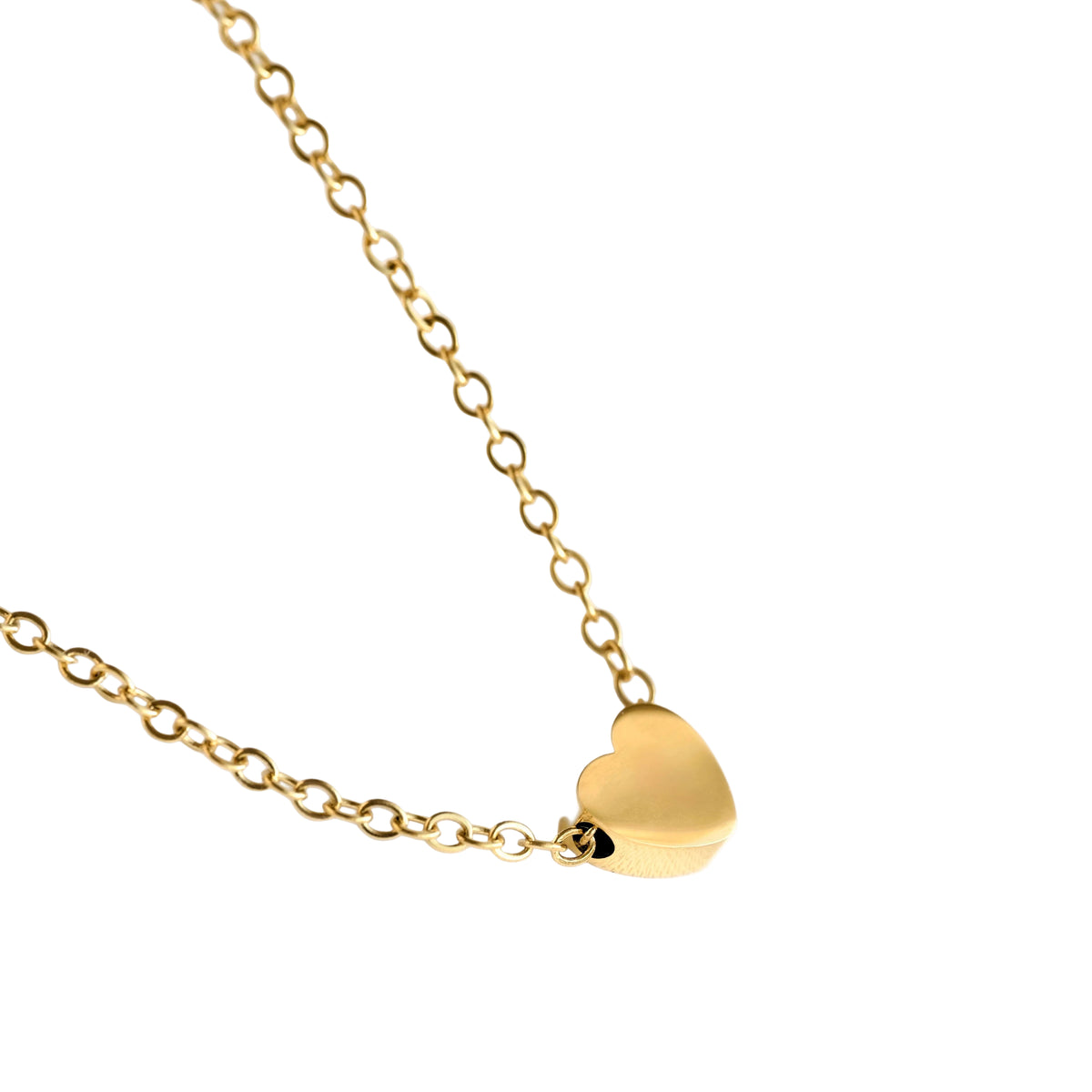 Gold heart-shaped pendant on a chain against a white background