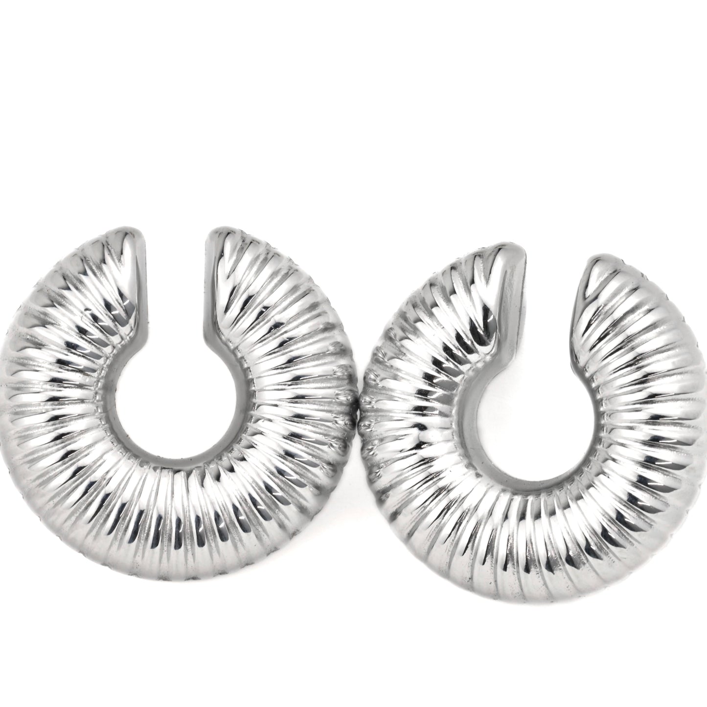 Textured Silver hoops on a white background