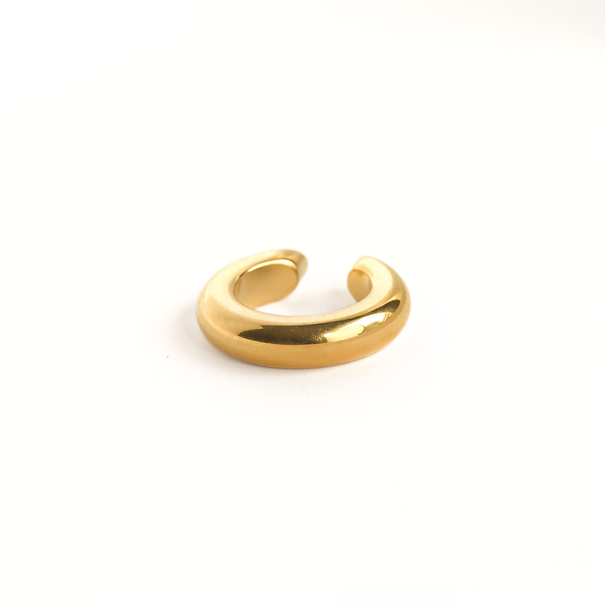 Bold dome ear cuff on a white background