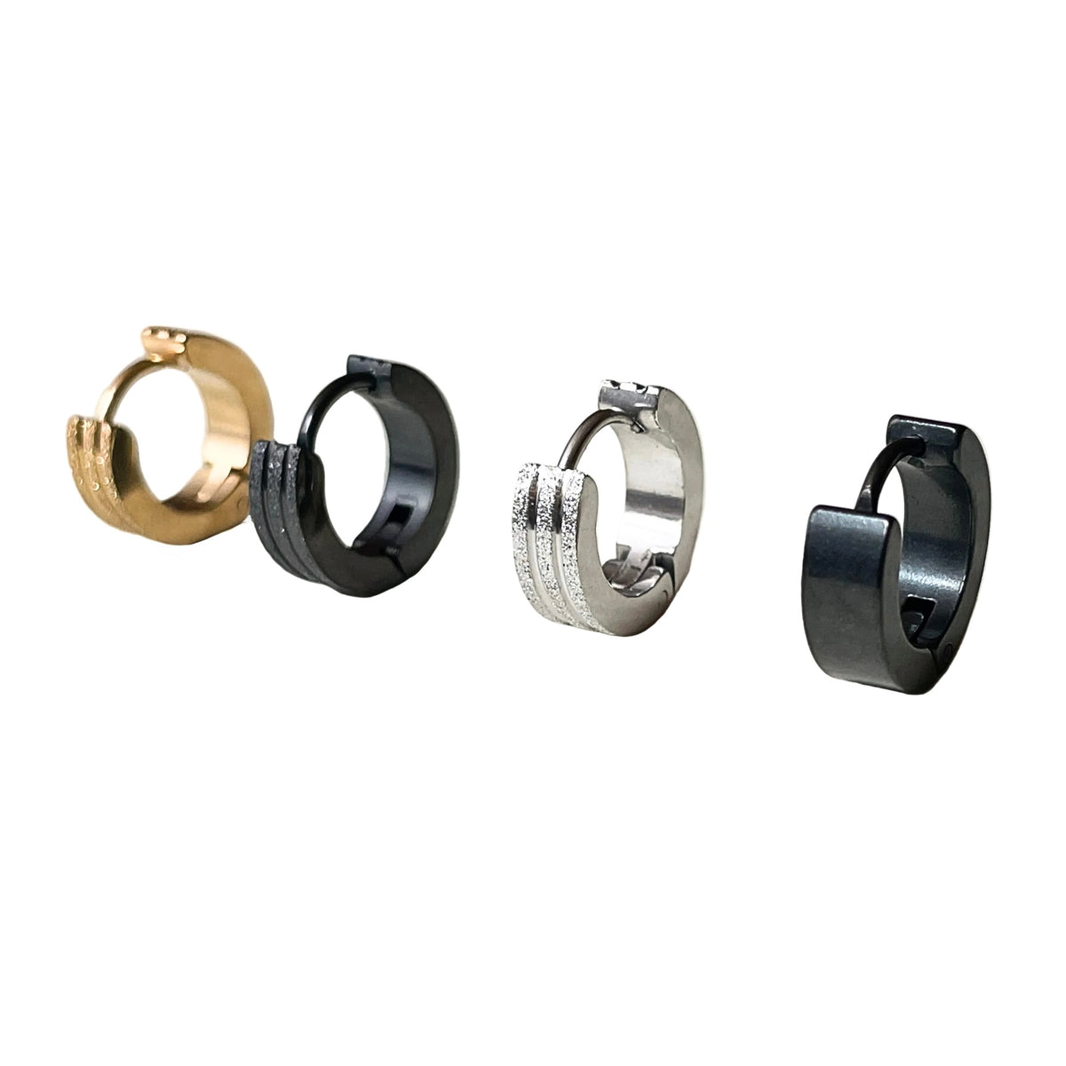 Set of four hoop earrings in gold, black, silver, and gunmetal on a white background