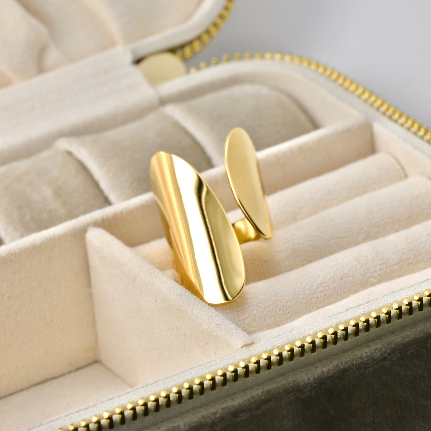 Chunky ring in a jewelry box with a soft focus background
