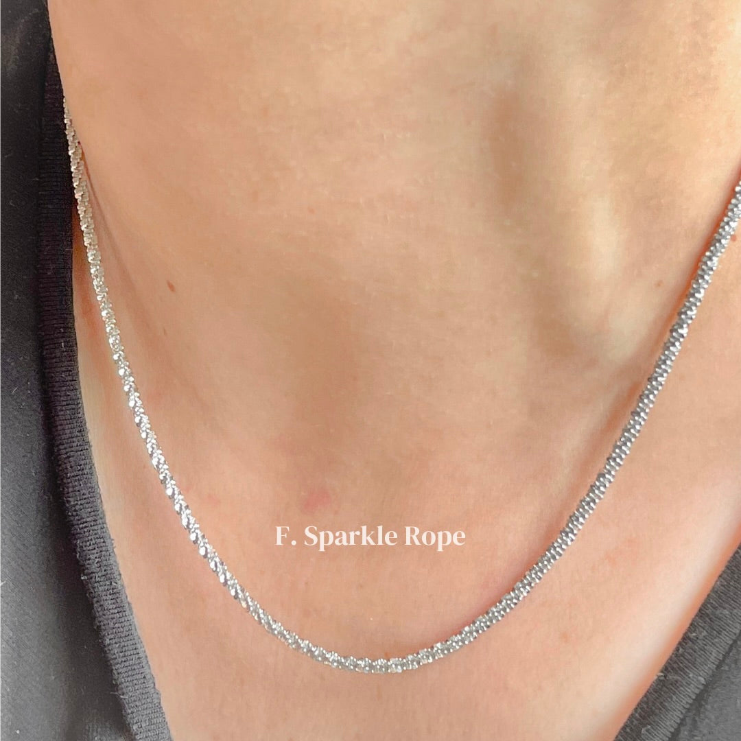 Silver Sparkle Rope necklace on a person's neck with a blurred background