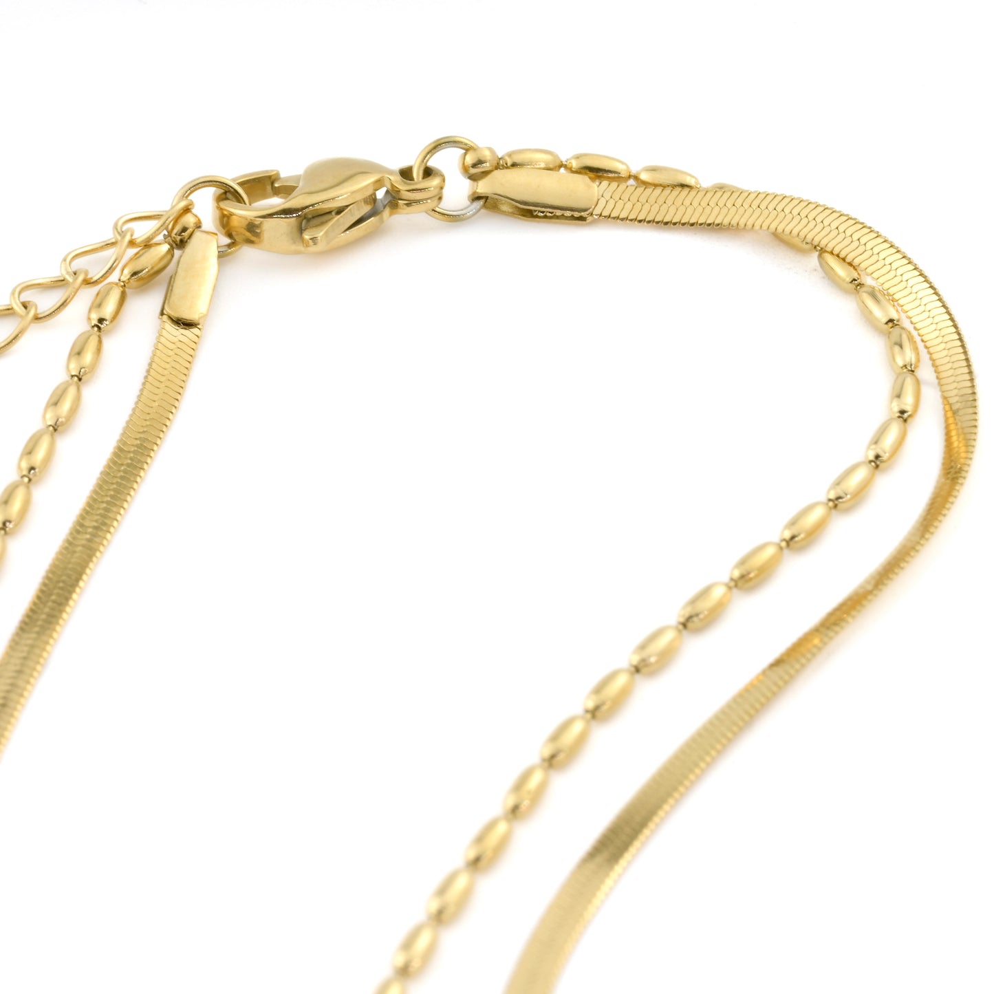 Gold chain anklet set with a lobster claw clasp and extender on a white background