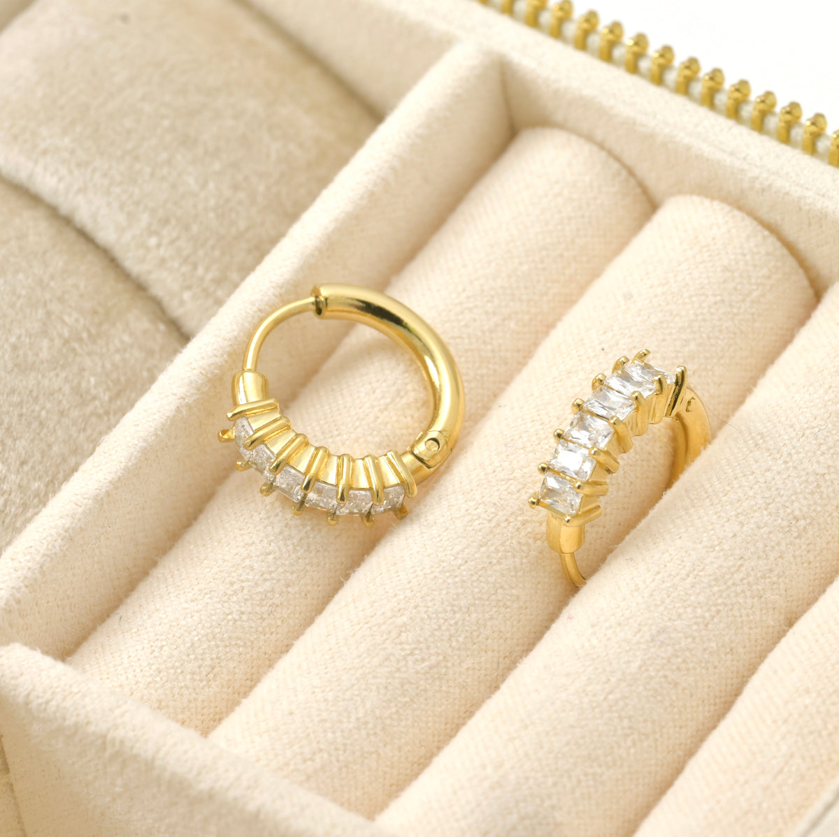 beige jewelry ox view of gold hoops