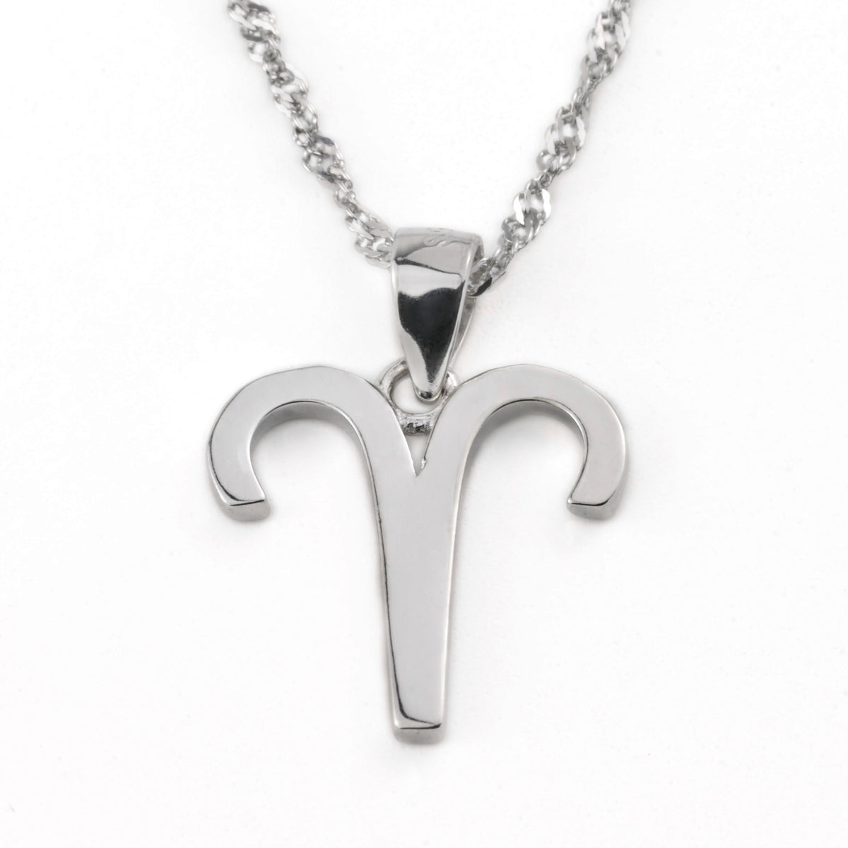 Silver Aries pendant necklace on a white background