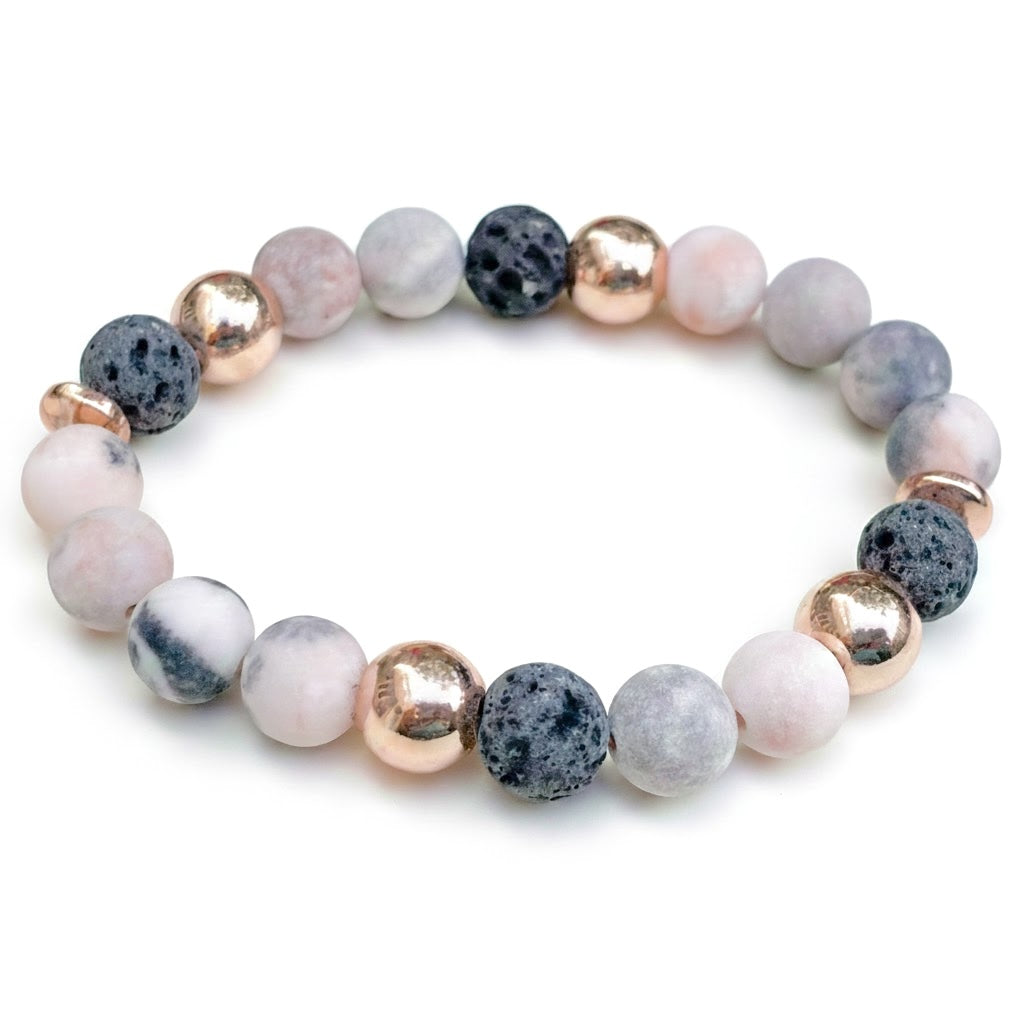 Multicolored beaded stretch bracelet on a white background