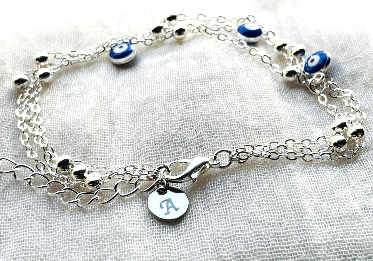 Layered Satellite Eye Anklet
