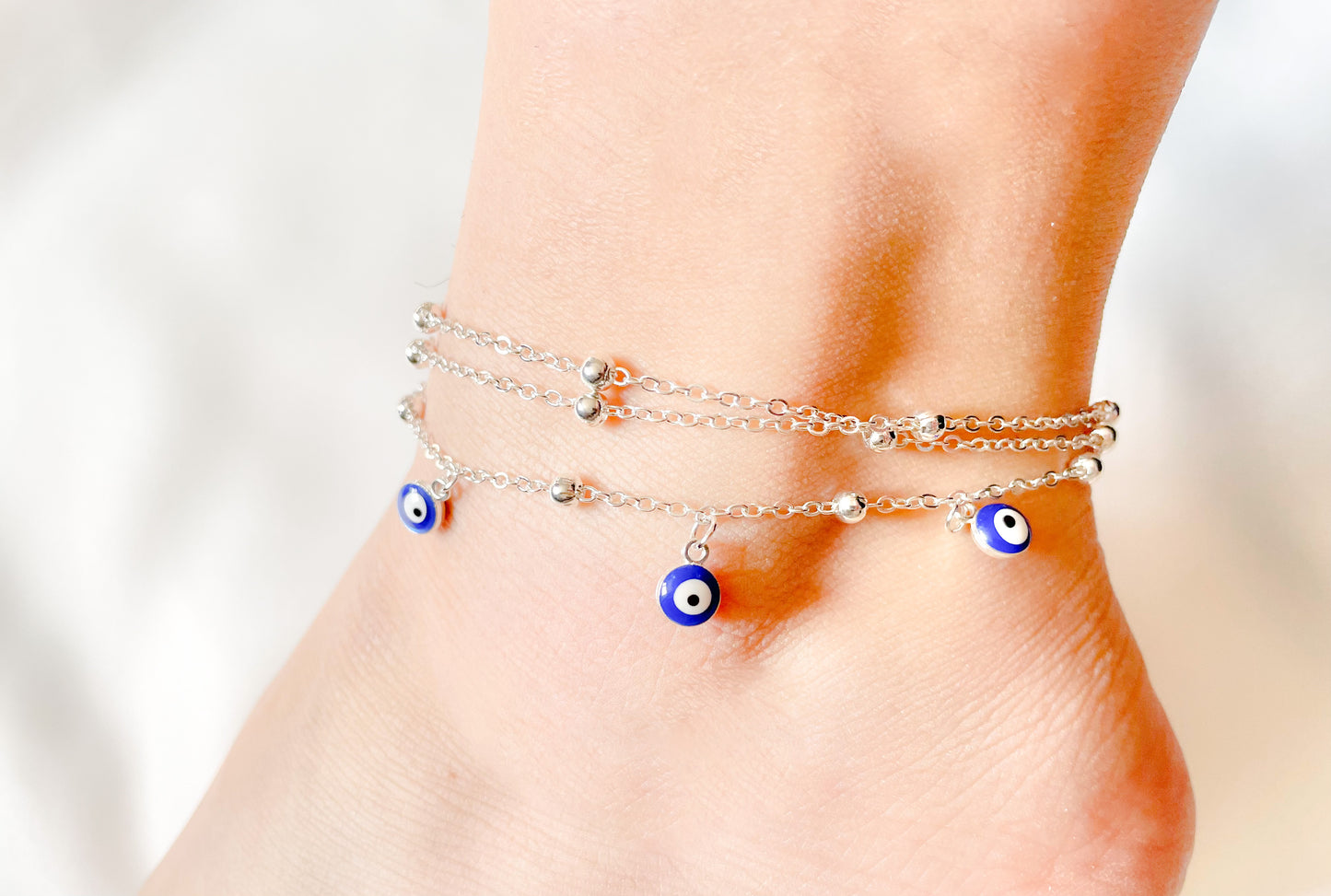 Layered Satellite Eye Anklet