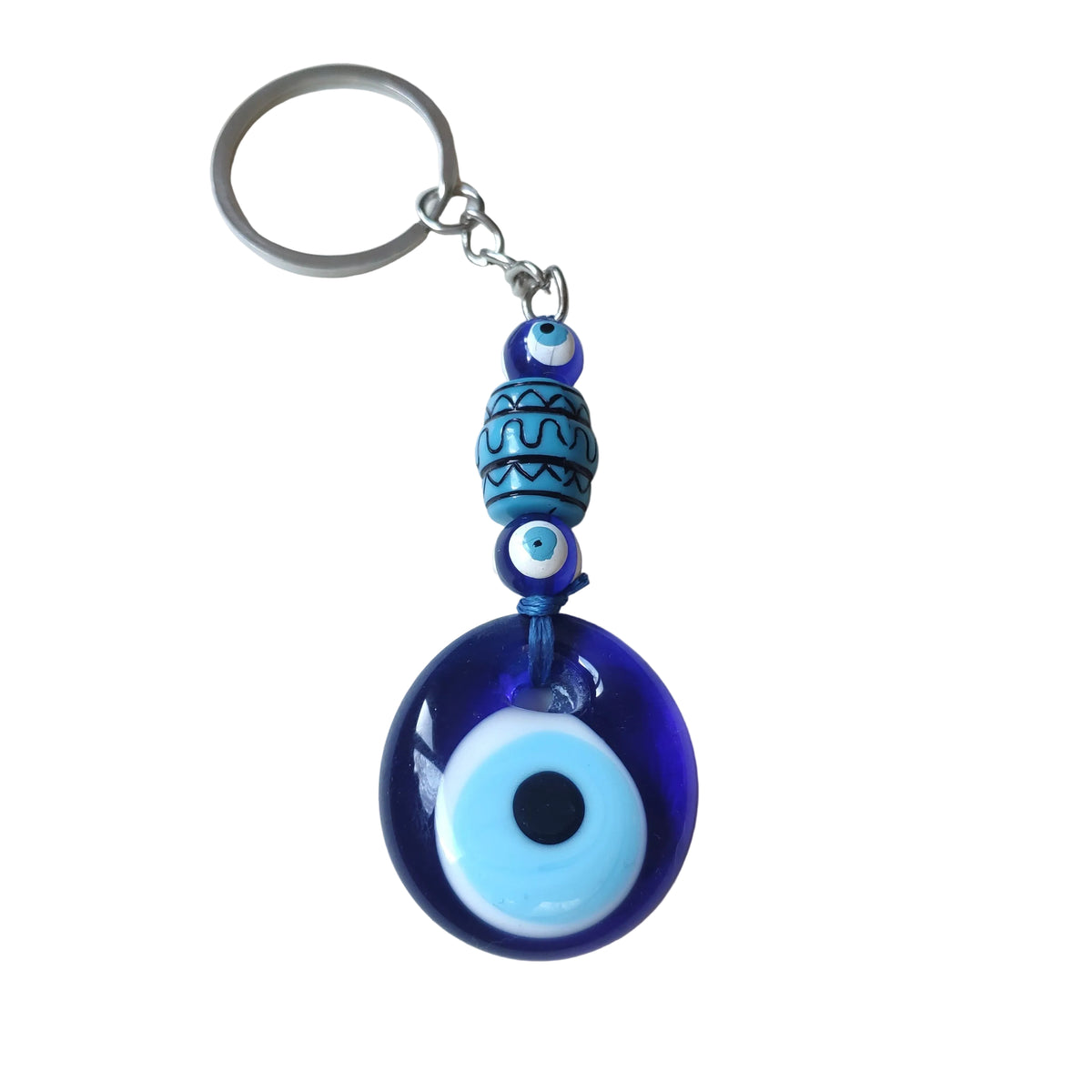 Blue evil eye keychain on a white rbackground