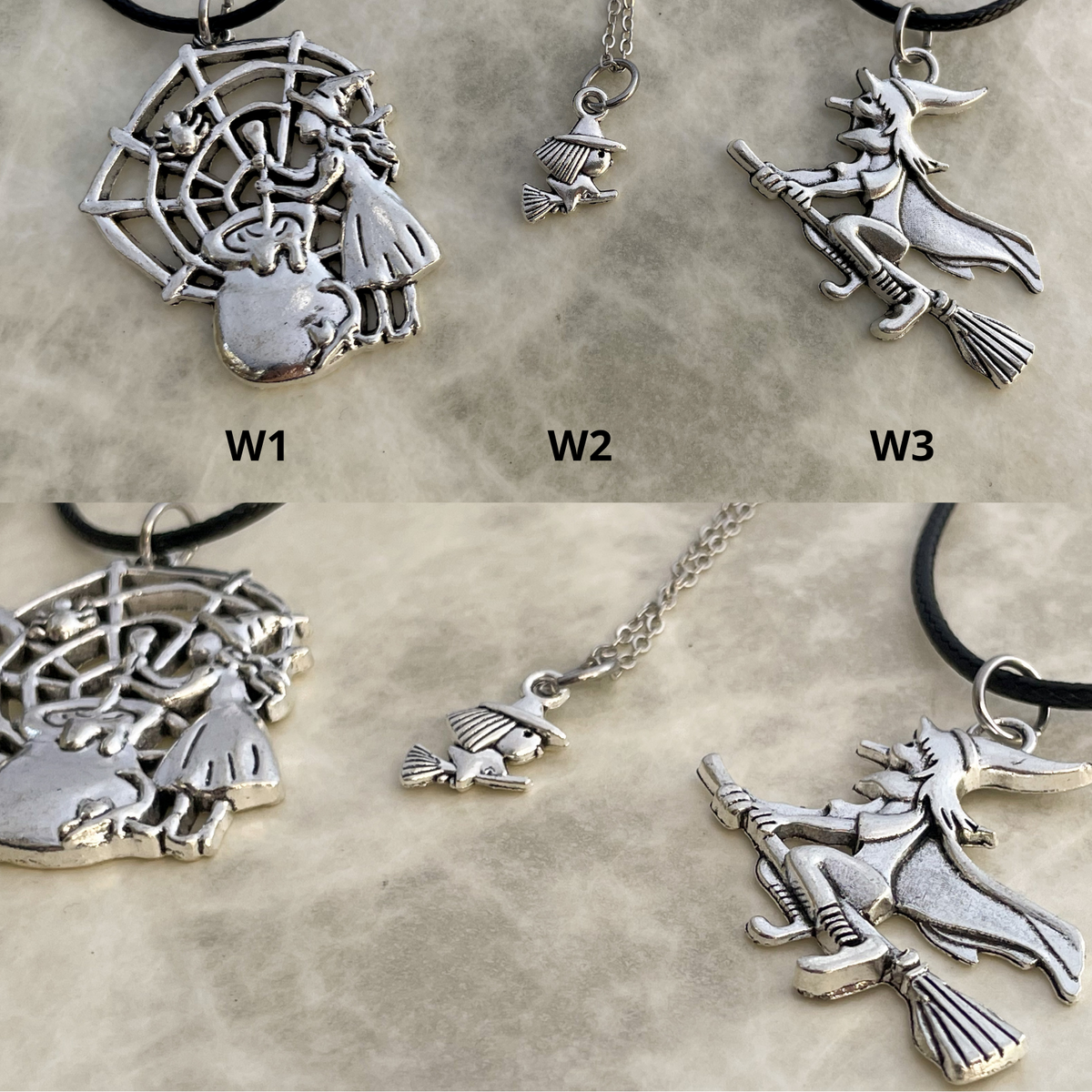 Collection of silver witch necklaces on a textured surface