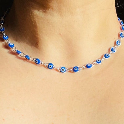 Evil eye choker with beads worn around a neck