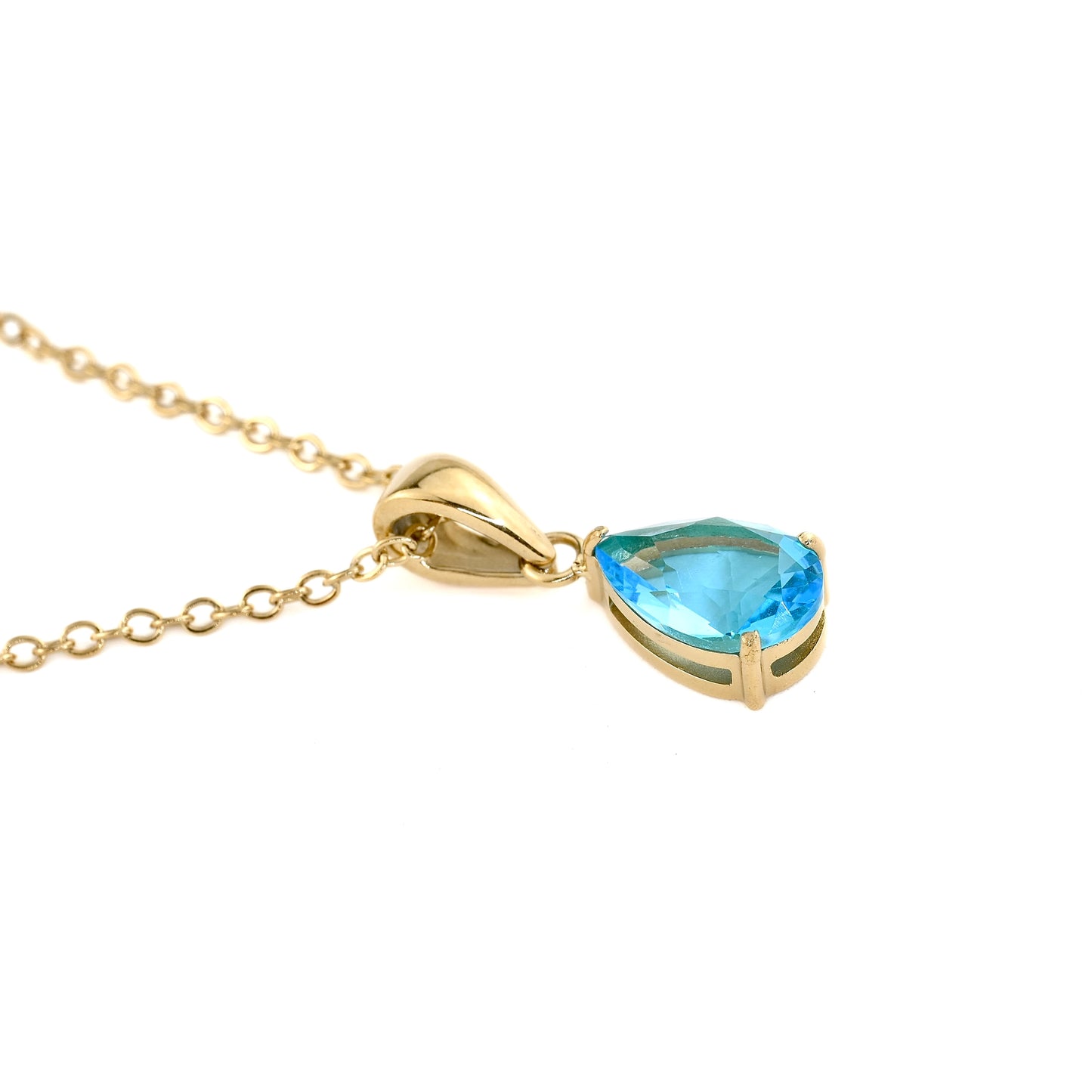 gold necklace with pear cut december birthstone 'turquoise' on a white background