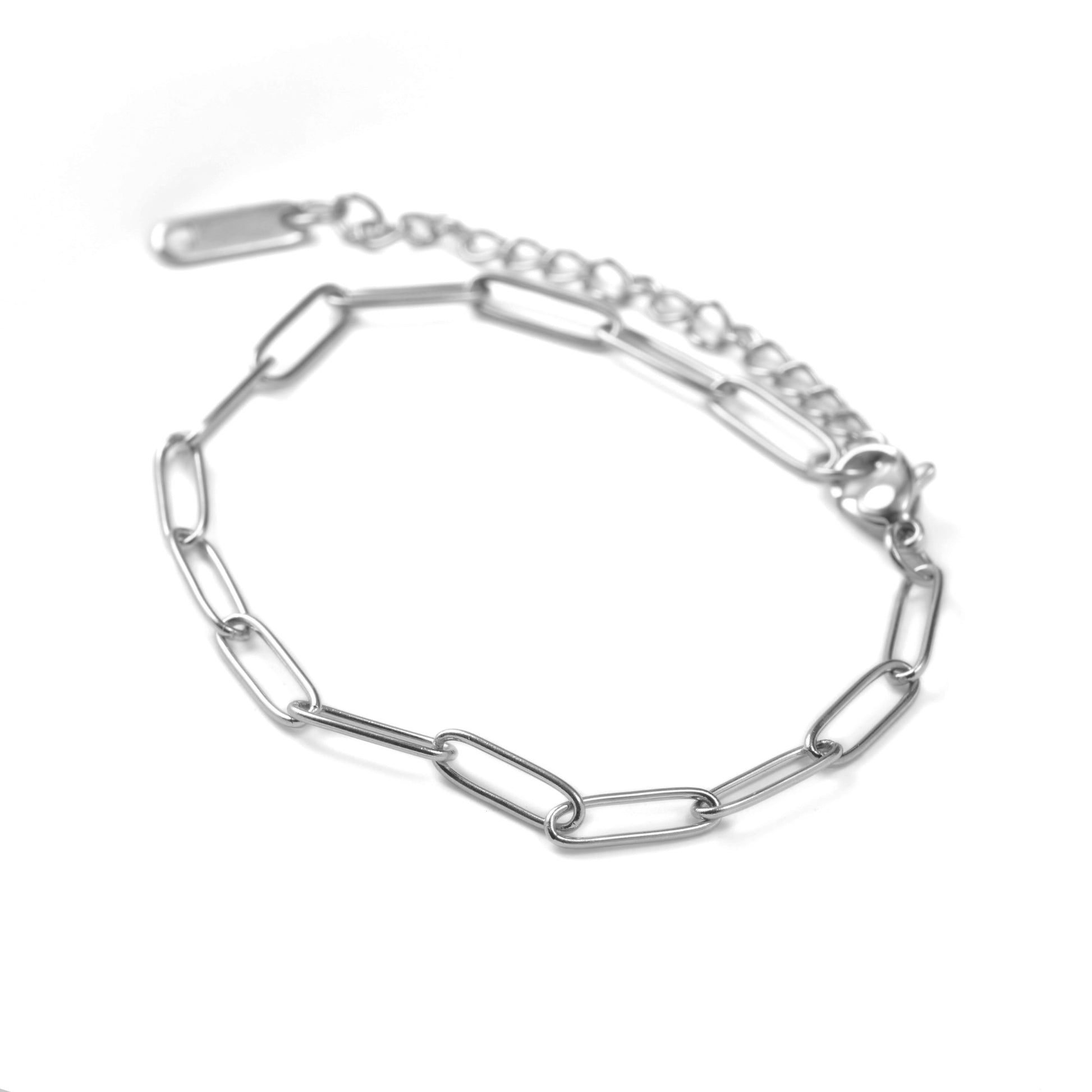 Silver paperclip chain bracelet on a white background