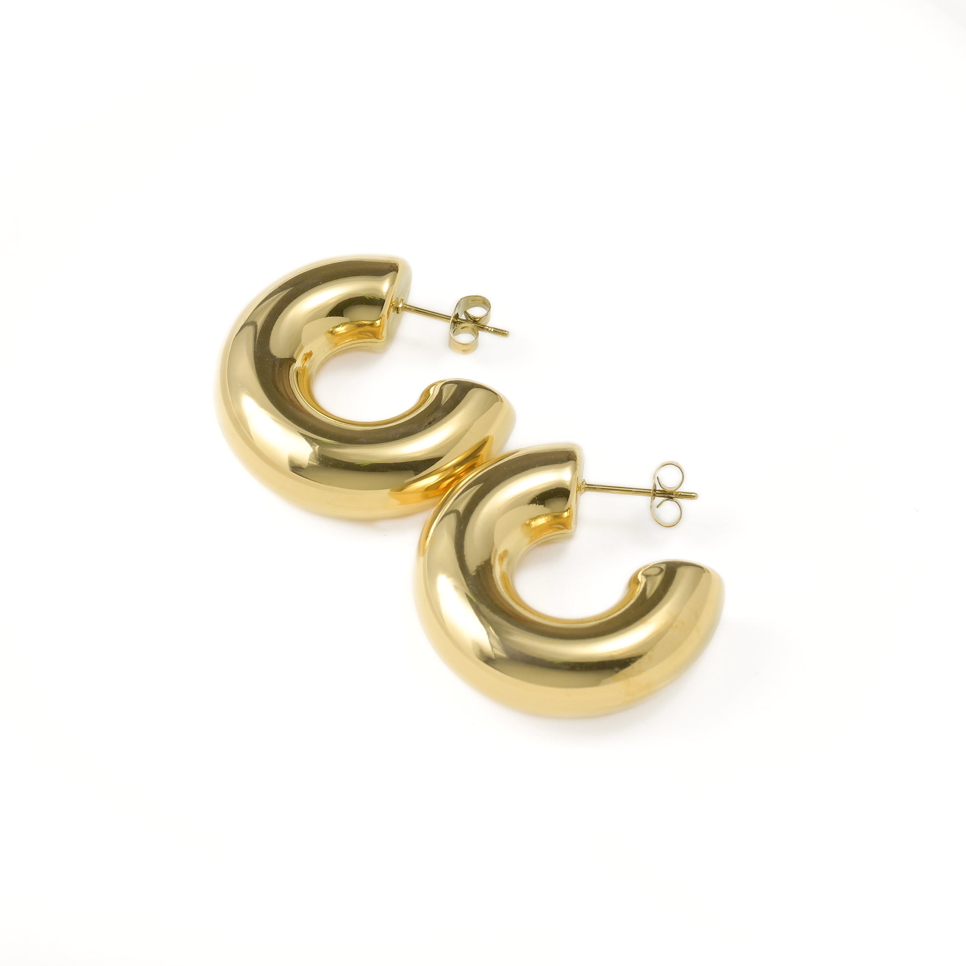 Chunky stainless steel earrings earrings on a white background