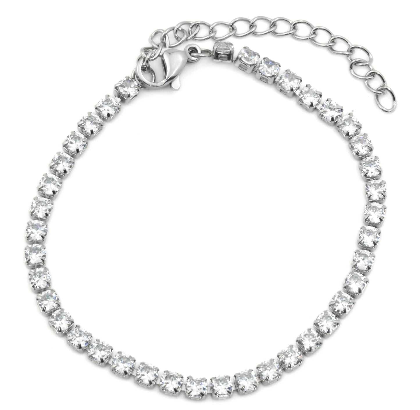Top view of silver tennis bracelet with clear gemstones on a white background