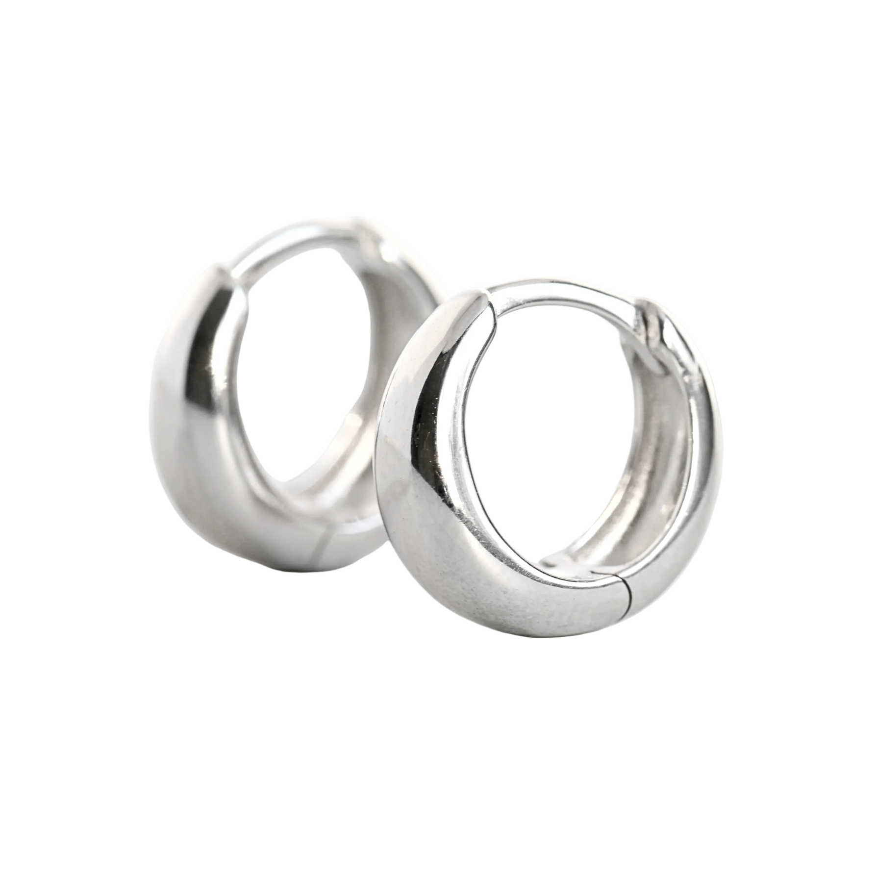 Pair of thick silver hoop earrings on a white background