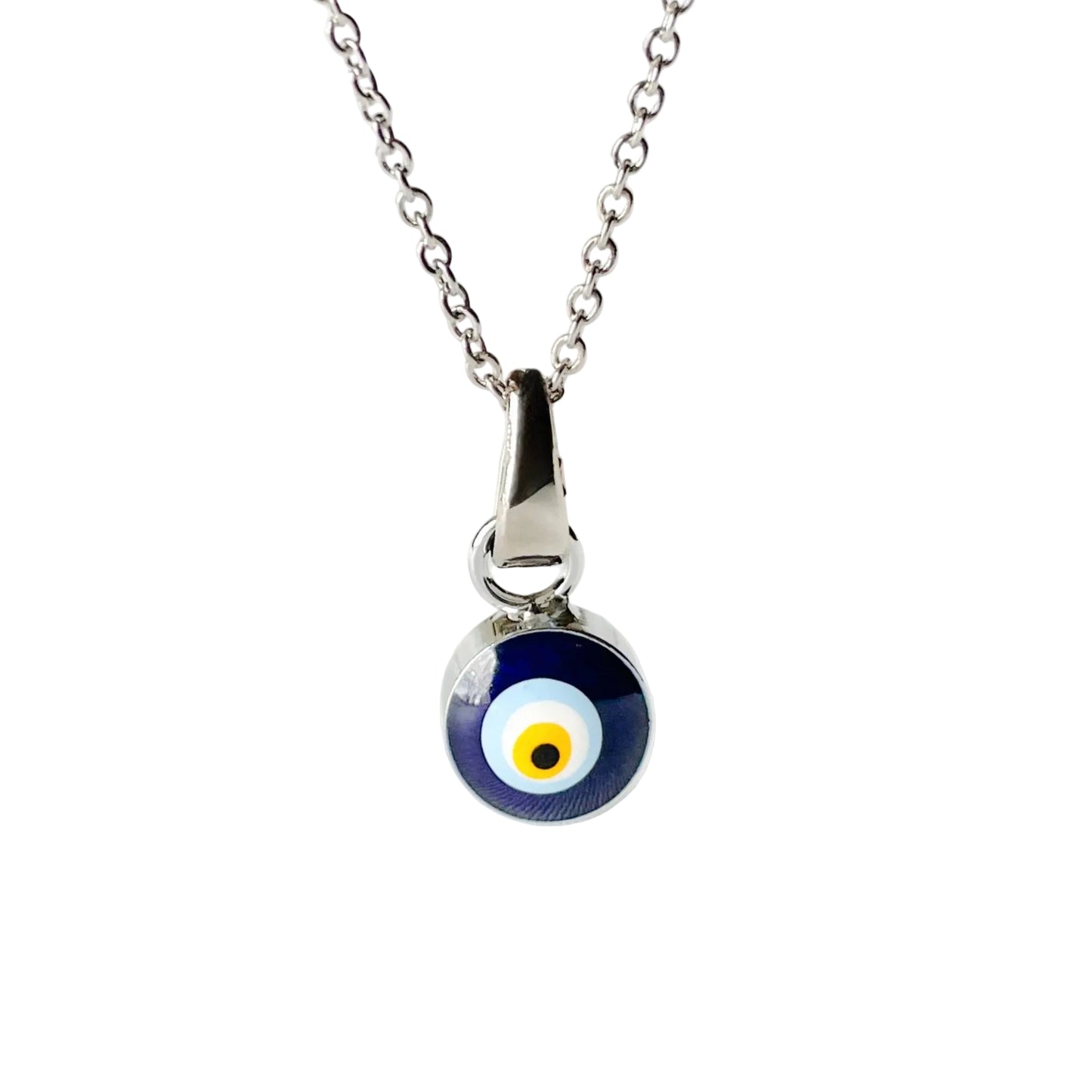 Silver necklace with a blue evil eye pendant on a white background