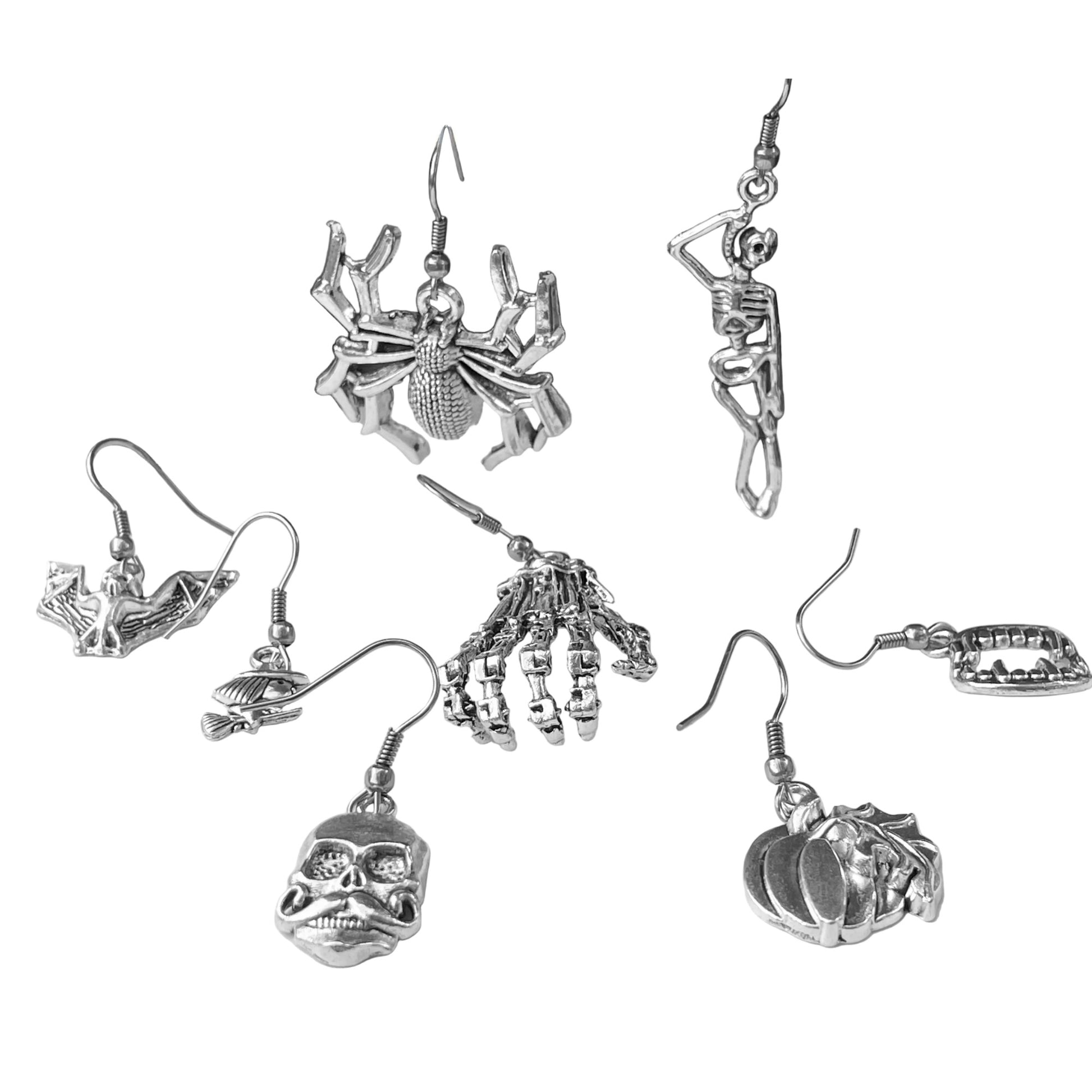 Collection of Halloween-themed silver earrings on a white background