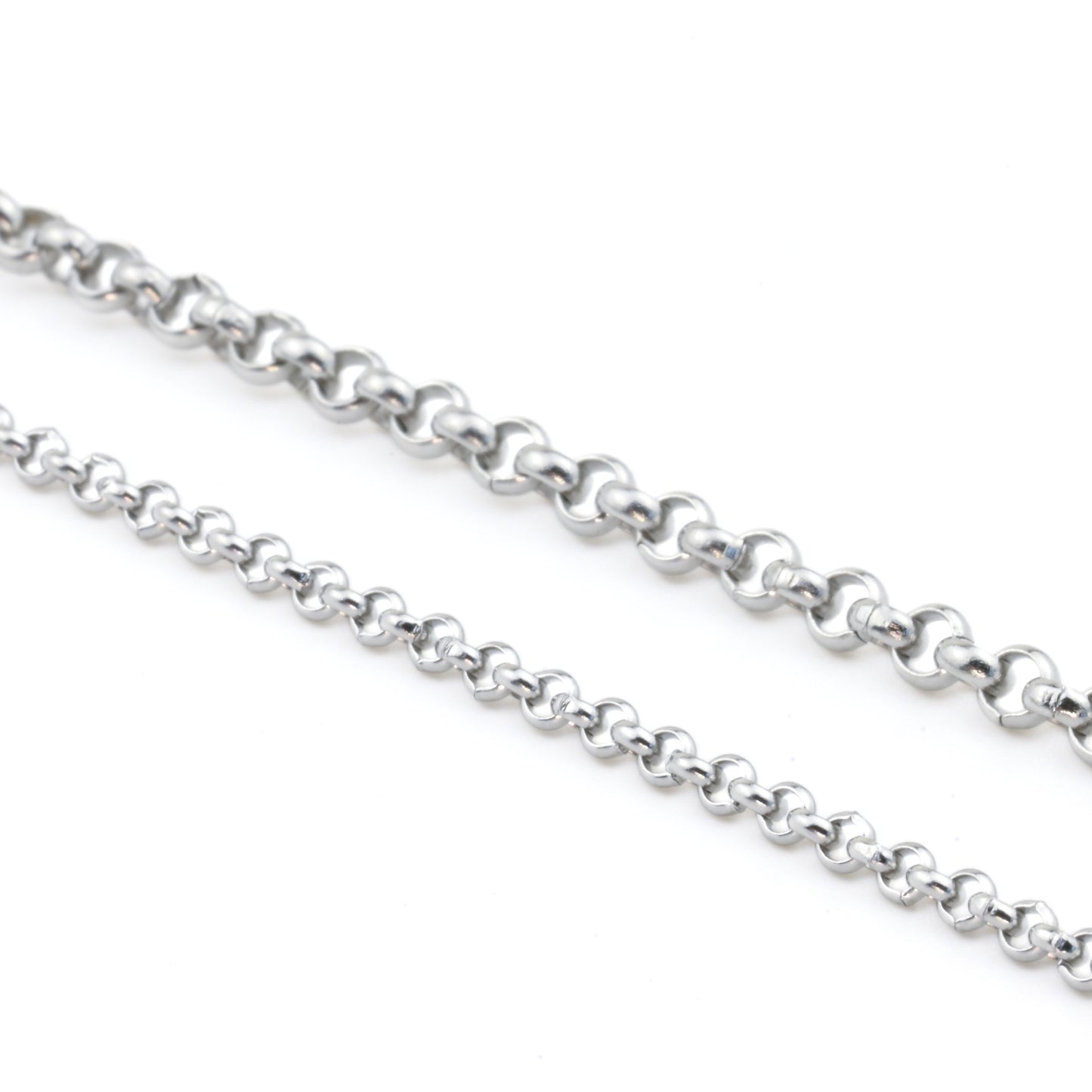 One thin and one thicker silver rolo chains on a white background