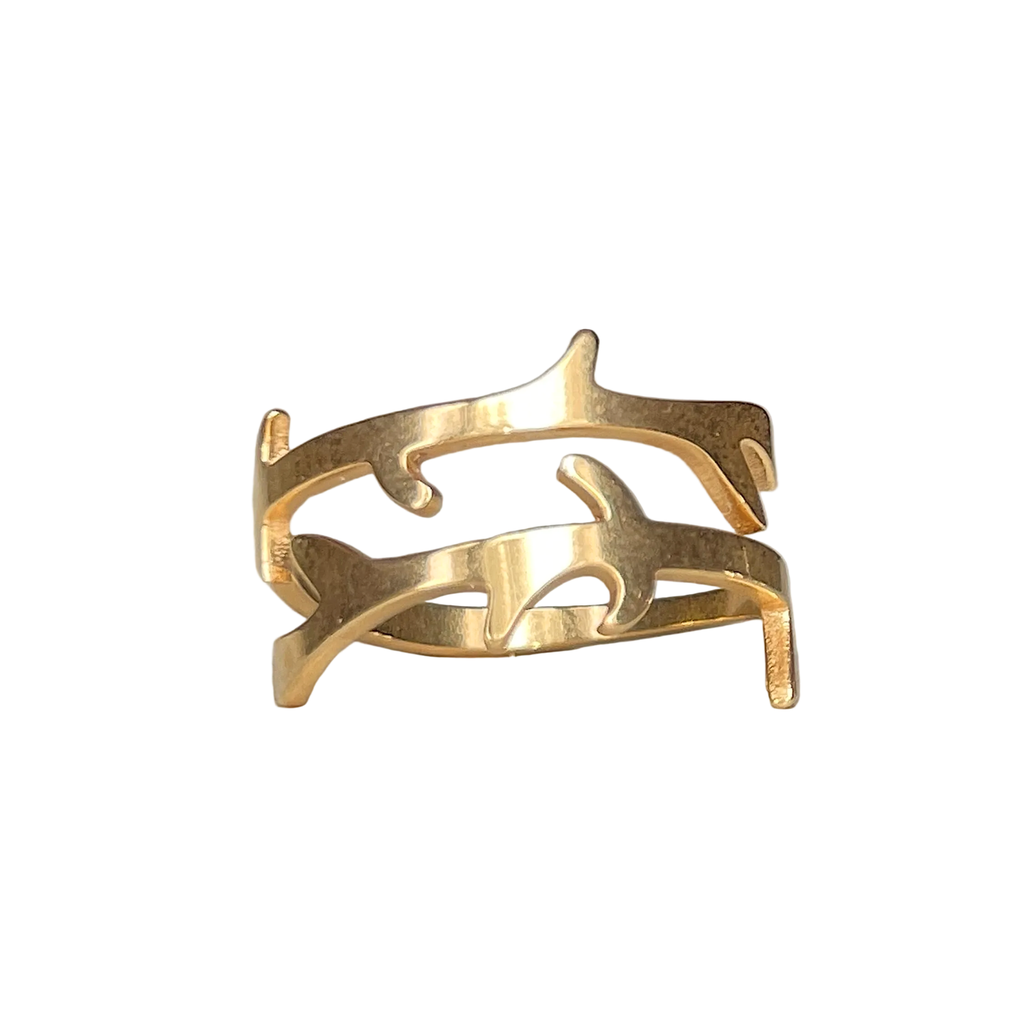 Front view of gold tree branch ring with an open design on a white background