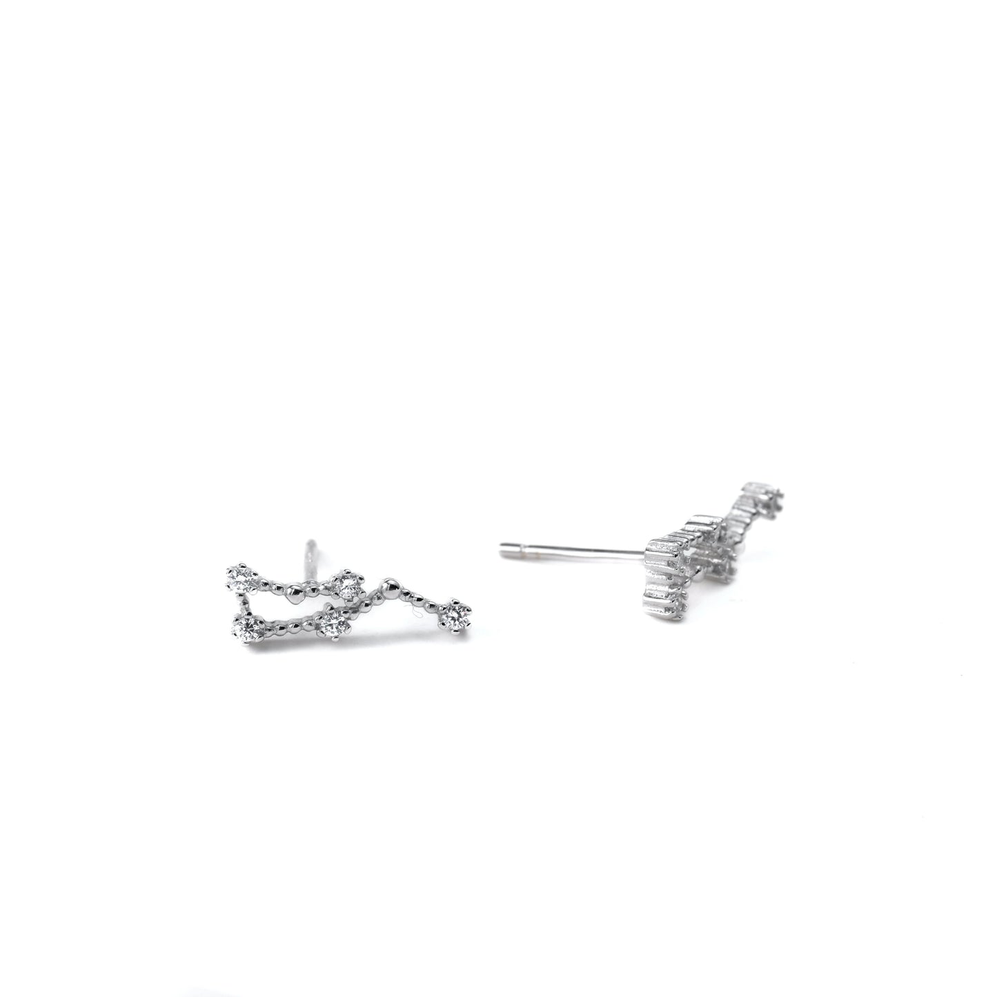 Silver constellation earrings on a white background