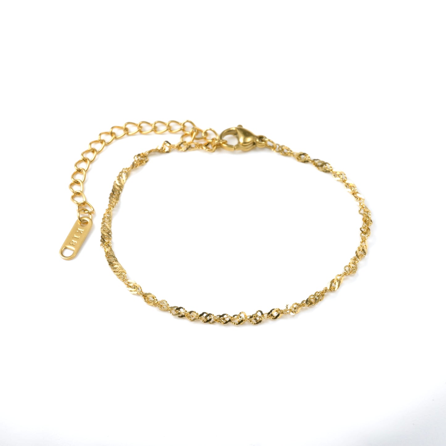 Gold  layering chain bracelet with a lobster clasp and rectanglular K18 hallmark showing 18k gold plating on a white background