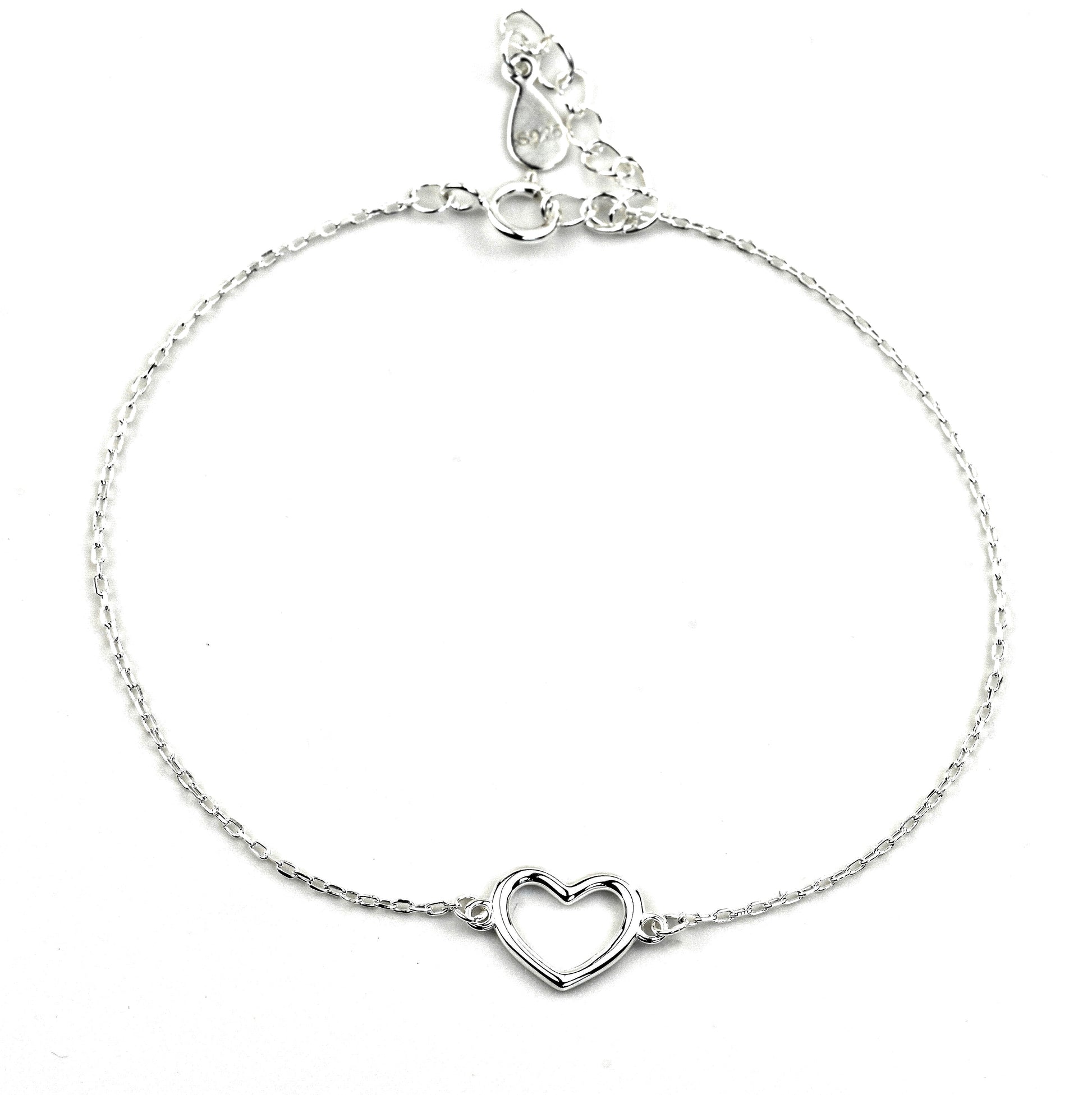 Silver bracelet with a heart charm, spring ring clasp and S925 stamped tag on a white background