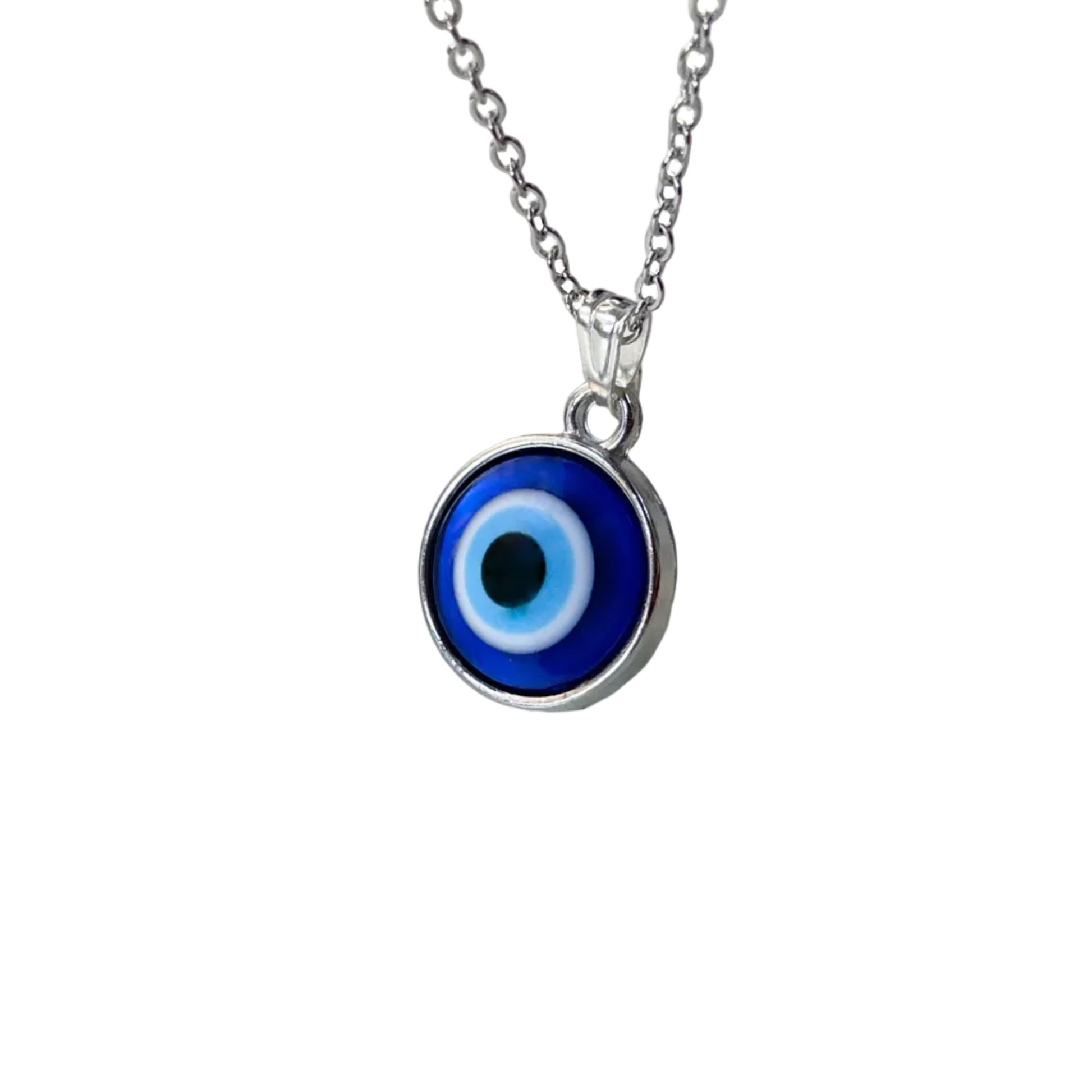 Blue evil eye pendant necklace with a silver cable chain on a white background