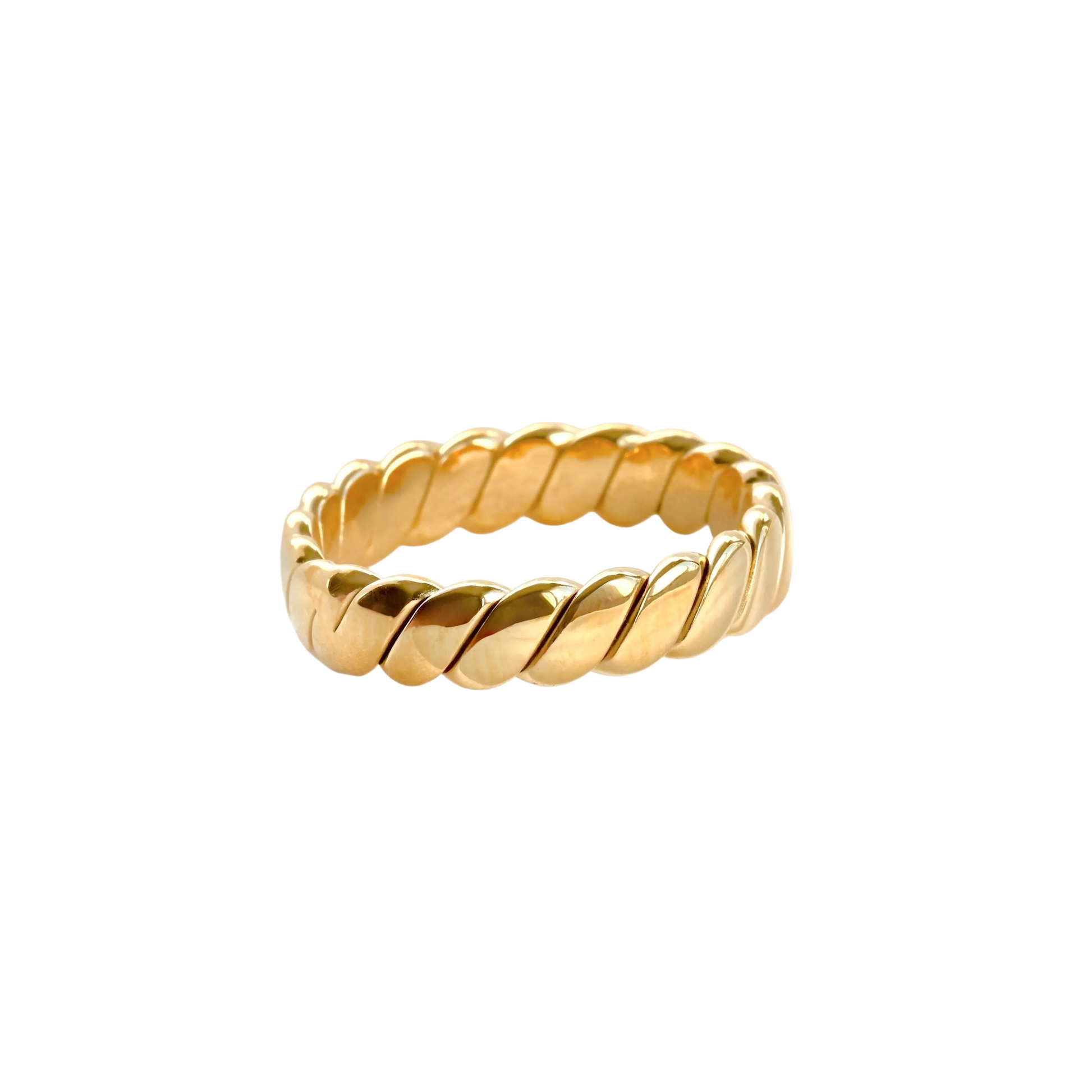Gold twisted ring on a white background