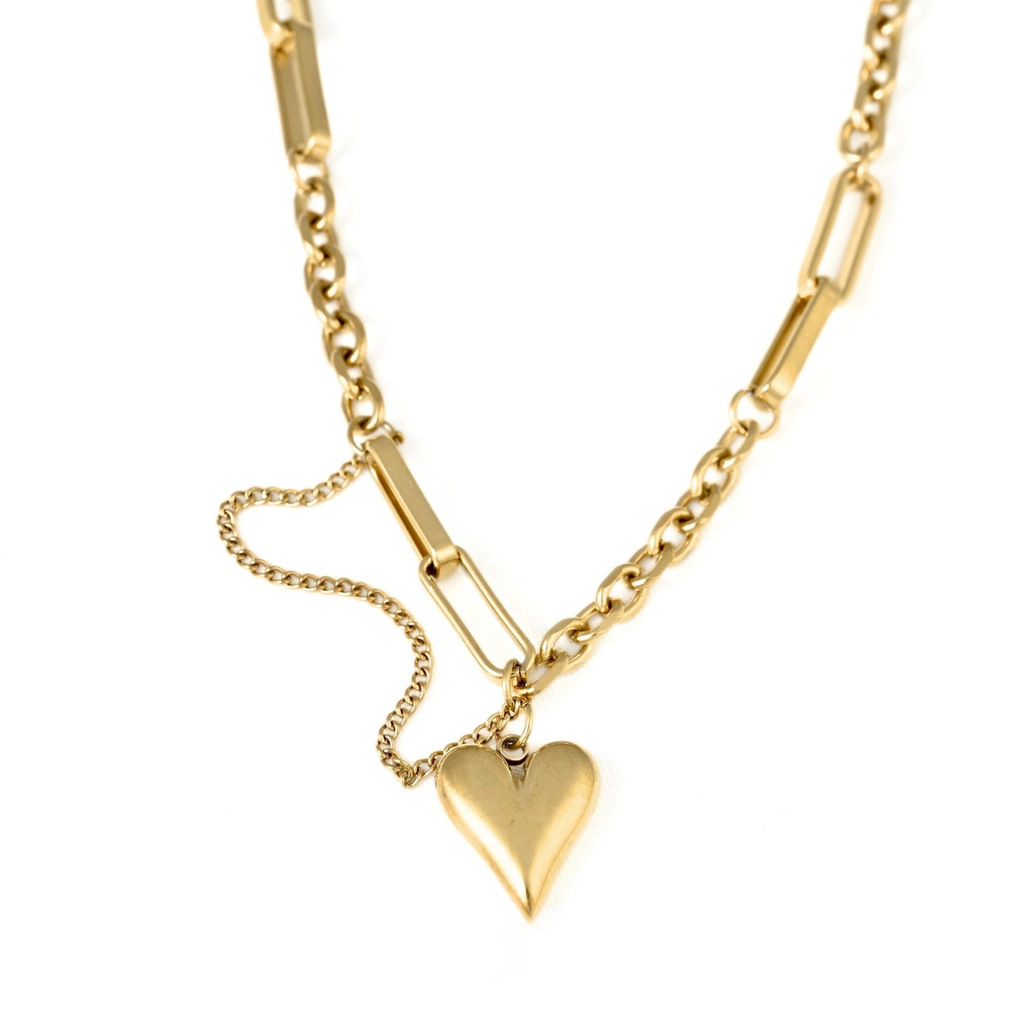 A gold chain necklace featuring a polished heart-shaped pendant and a small dangling chain with a rectangular link accent, shown on a plain white background.