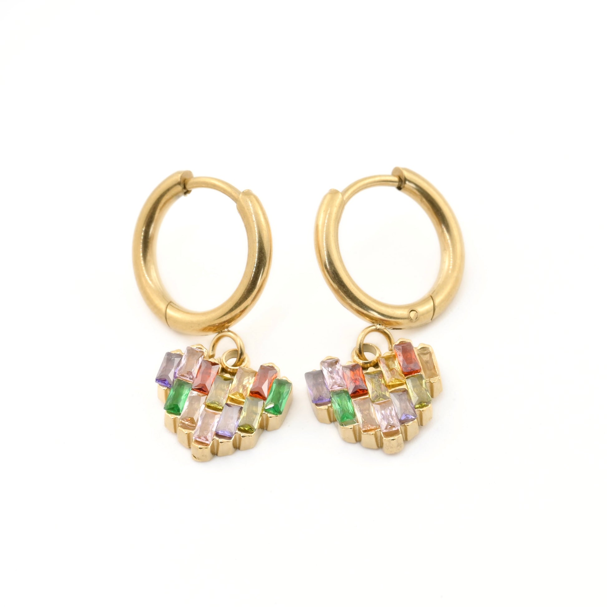 Gold hoop earrings with multicolored gemstones on a white background