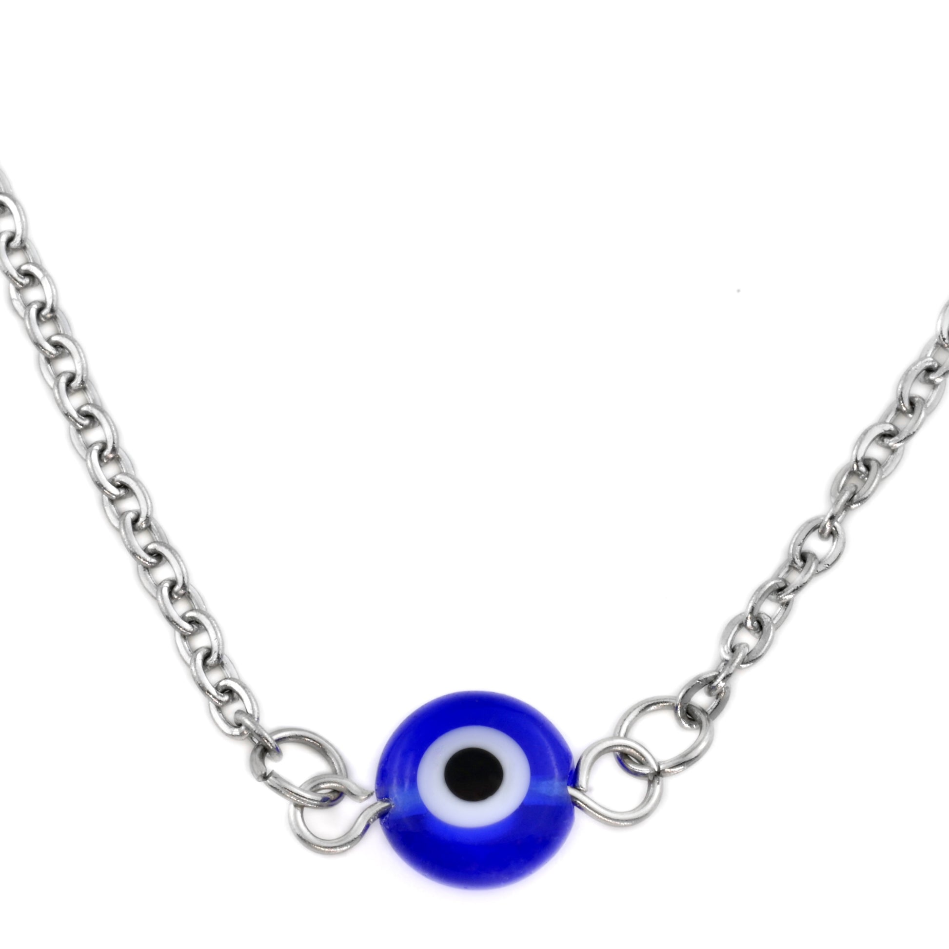 Close-up view of silver cable chain necklace with a blue evil eye charm connector on a white background