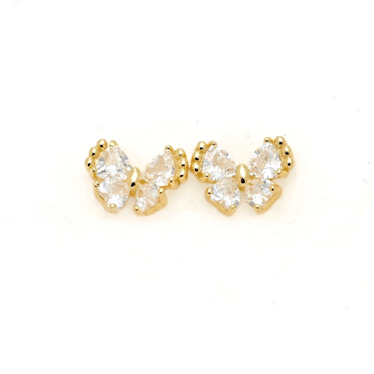 A pair of gold butterfly stud earrings with clear pear-cut gemstones, displayed on a clean white background.