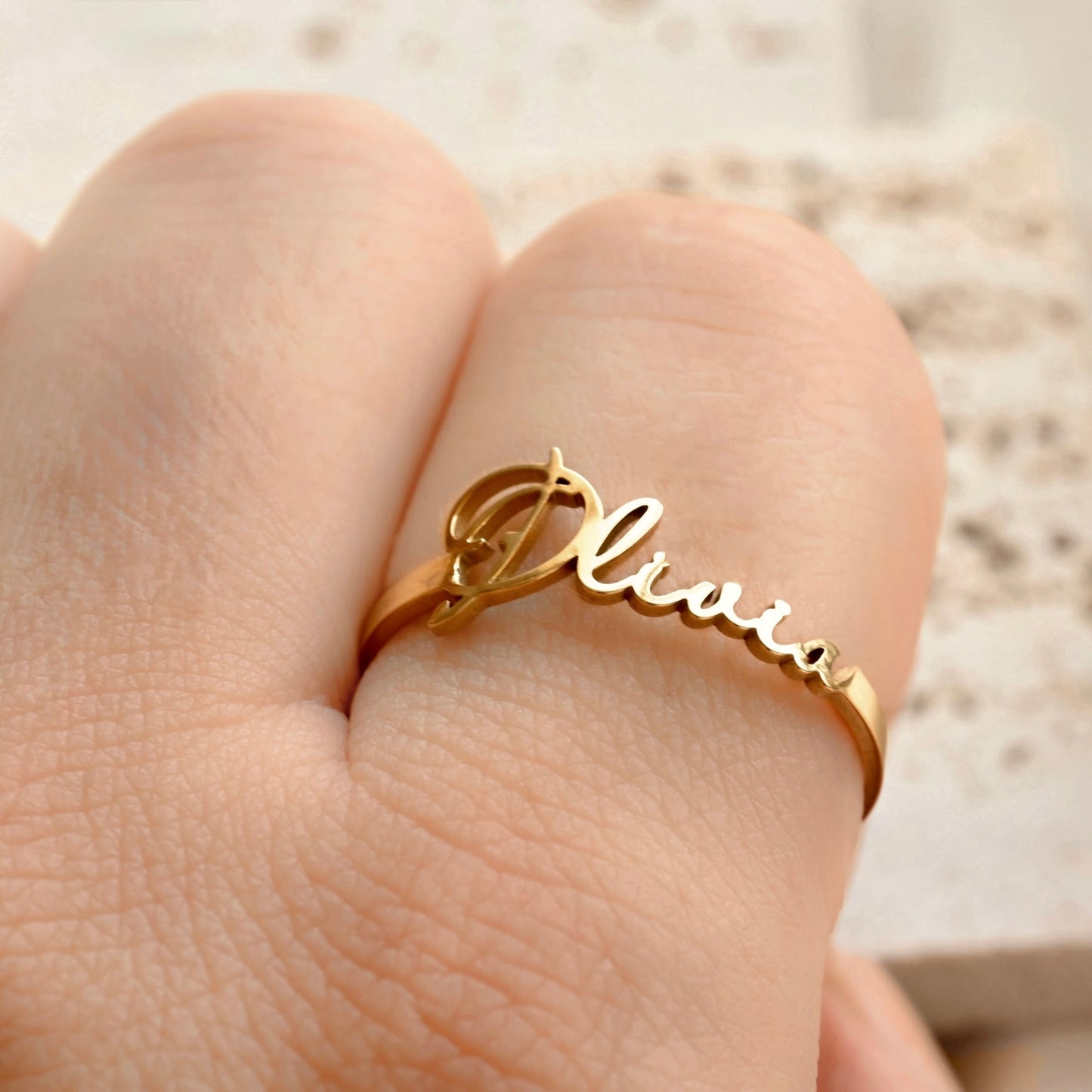 front view of 'Olivia' ring on finger