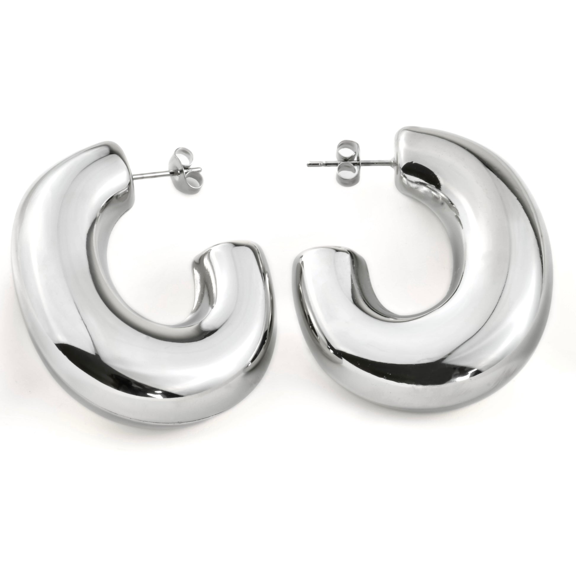 Silver oval C hoop earrings on a white background