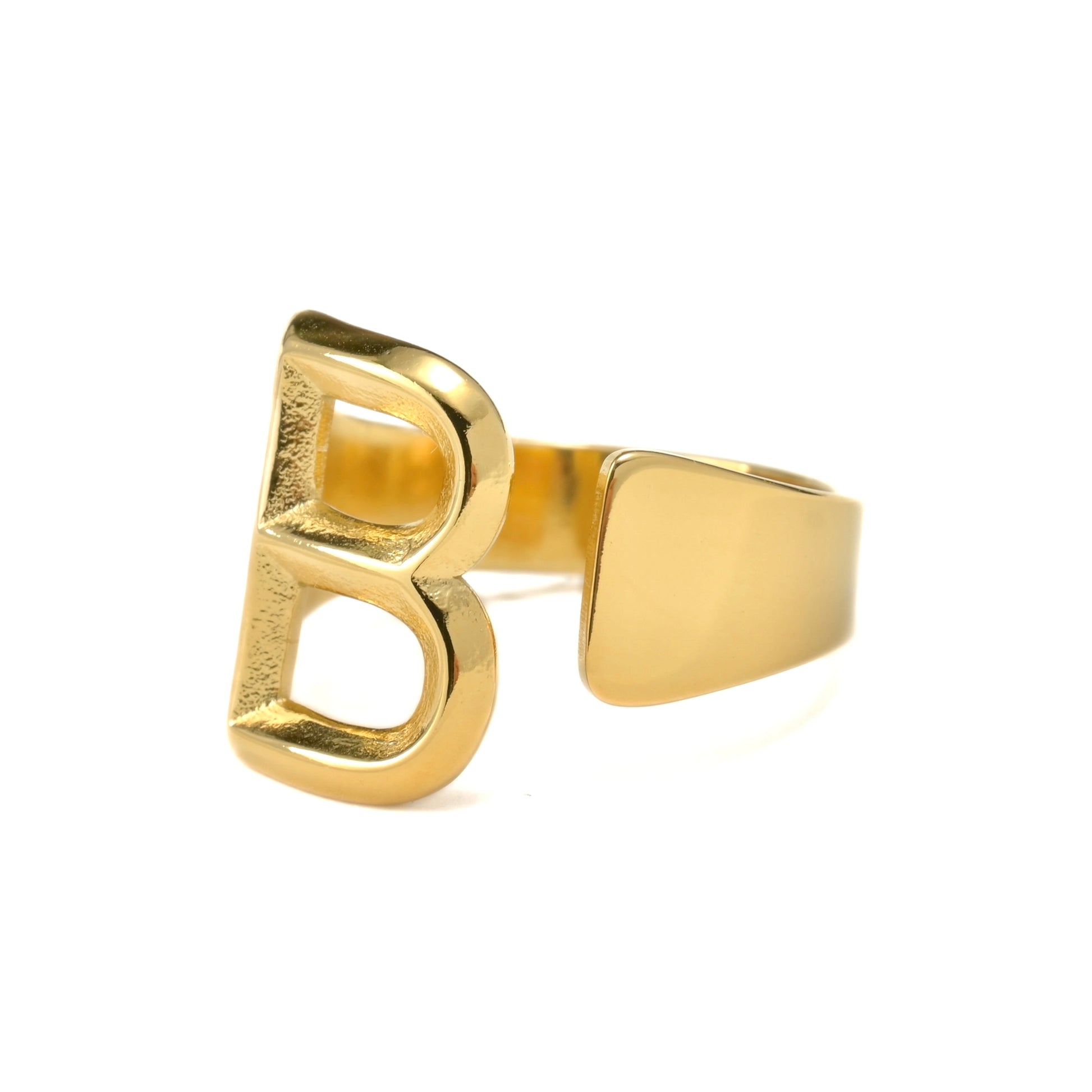 Gold letter 'B' ring on a white background