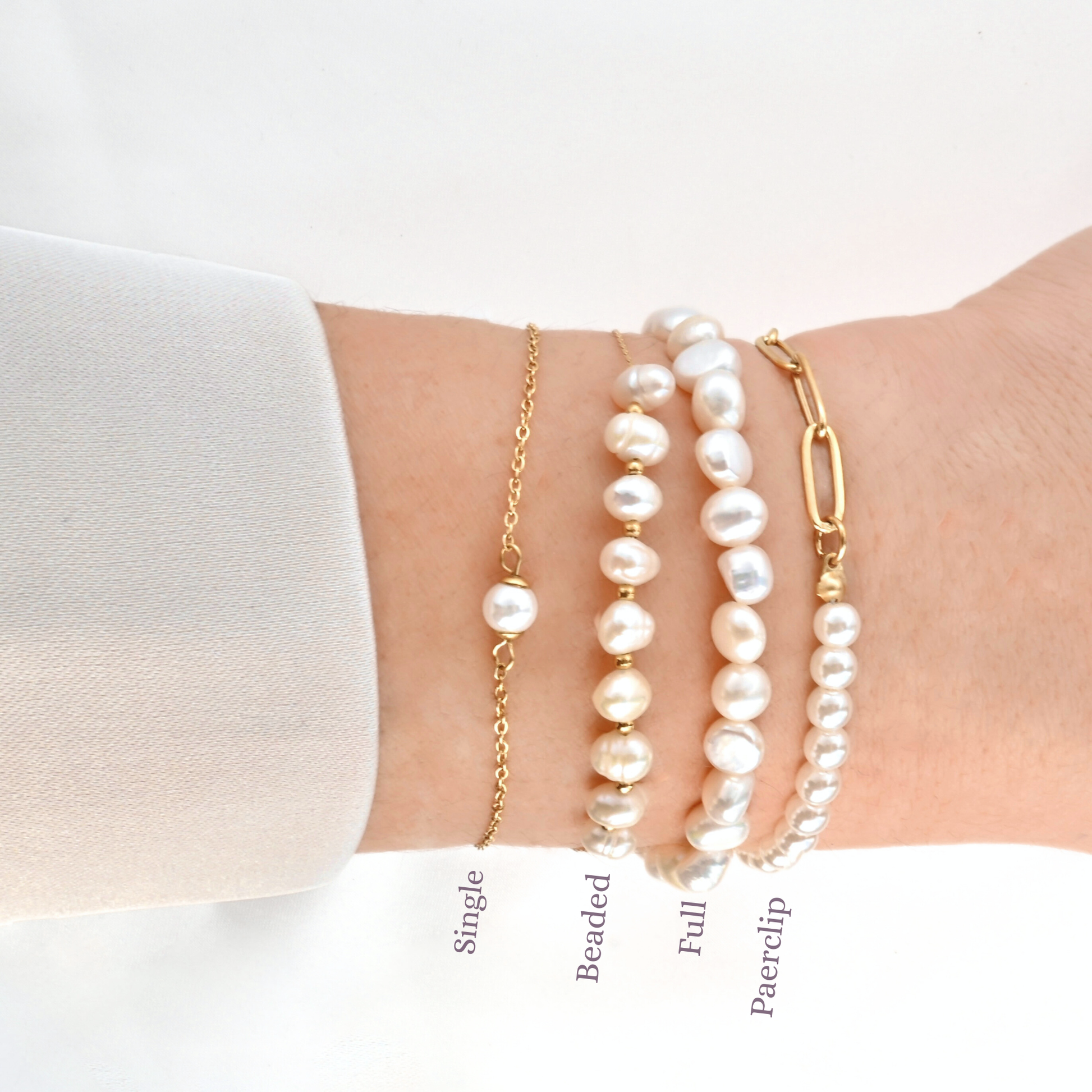 Four pearl bracelets on a wrist with labels for 'Single', 'Beaded', and 'Full' and 'Paperclip' on a white background.