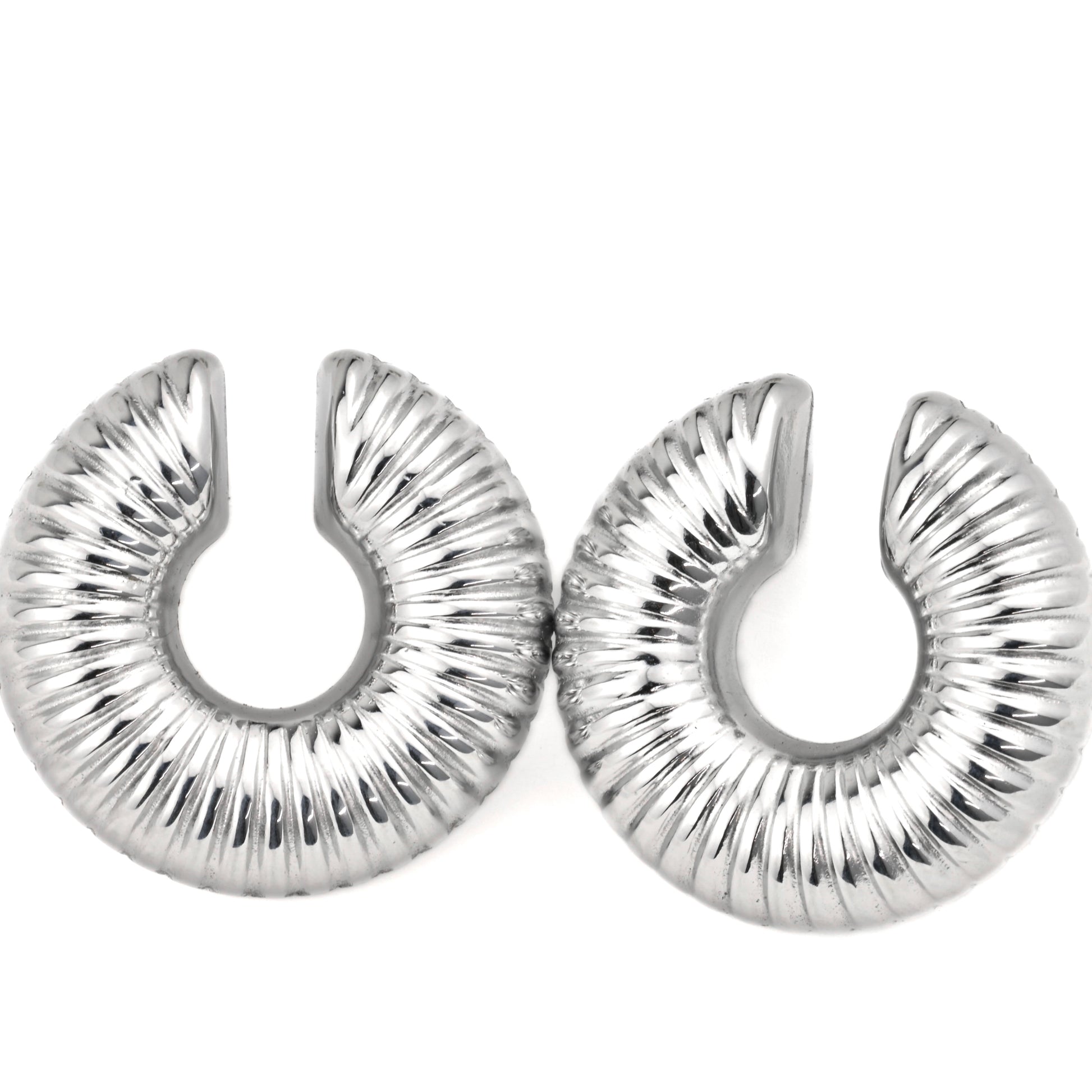 Textured Silver hoops on a white background
