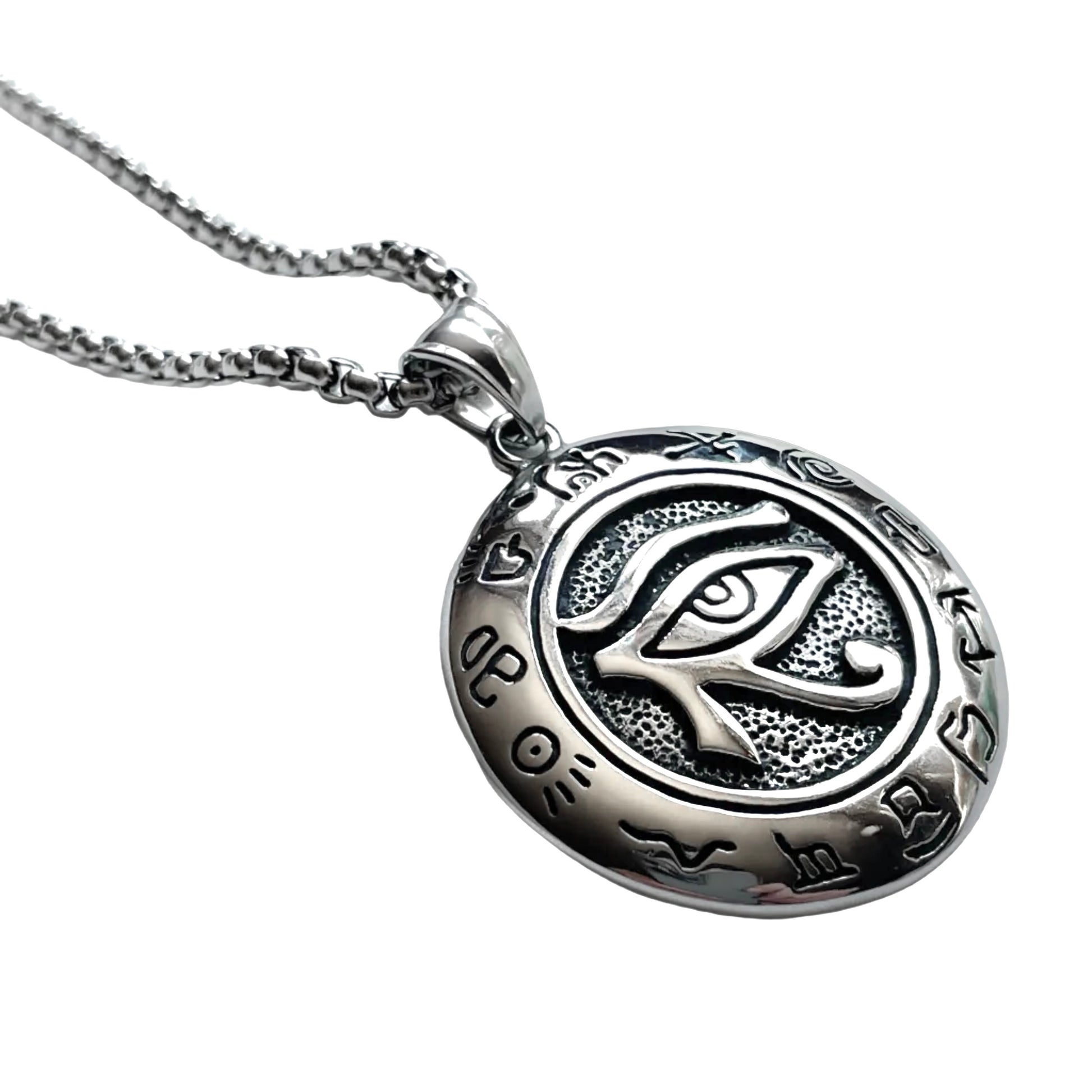 Silver evil eye medallion necklace on a white background