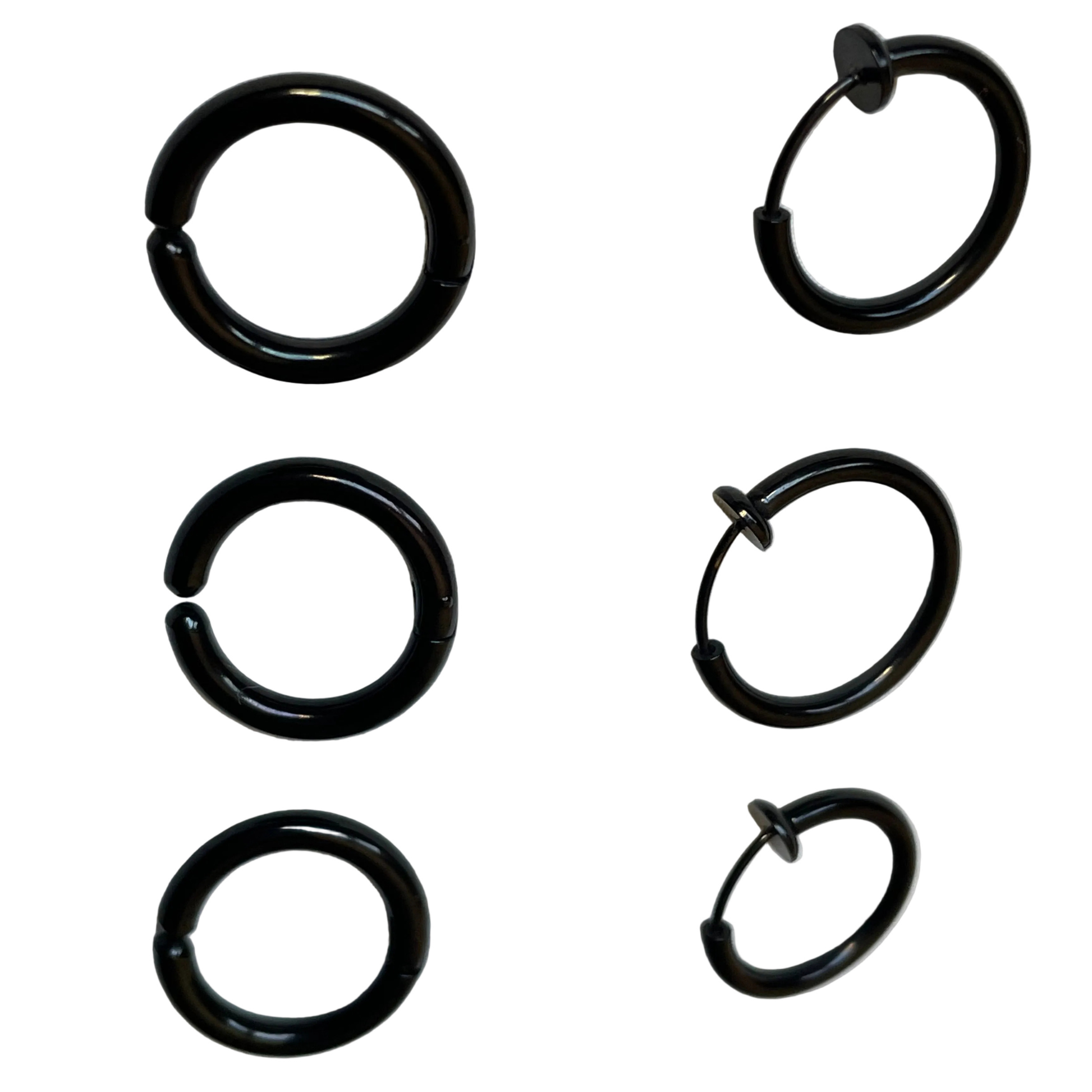 Set of six black no piercing hoop earrings on a white background
