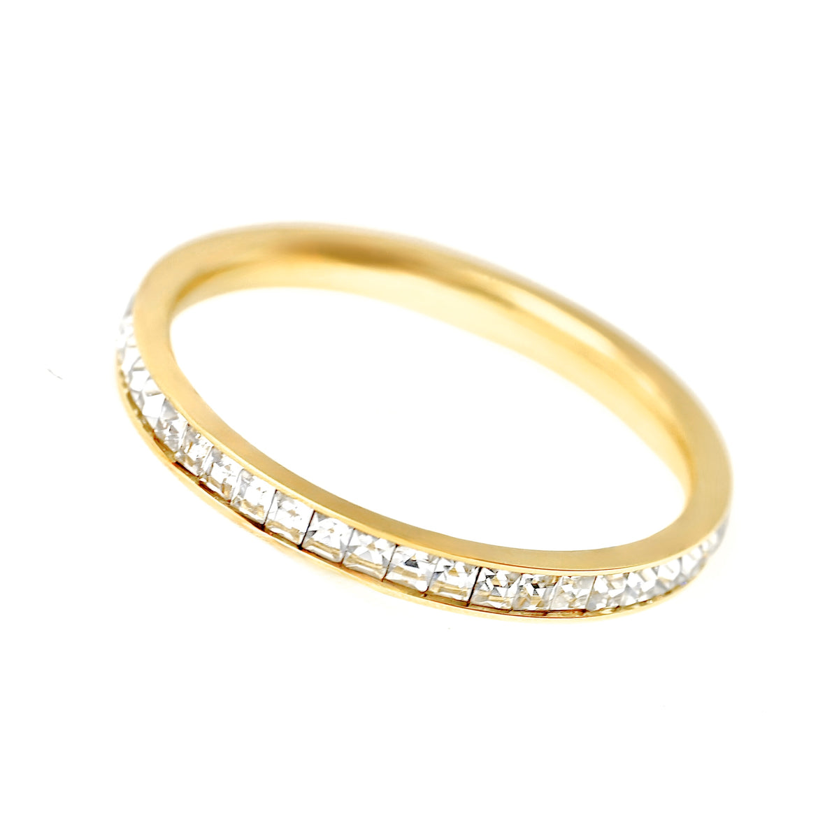 A yellow gold eternity ring featuring a continuous channel setting of clear baguette-cut diamonds, shown on a plain white background.
