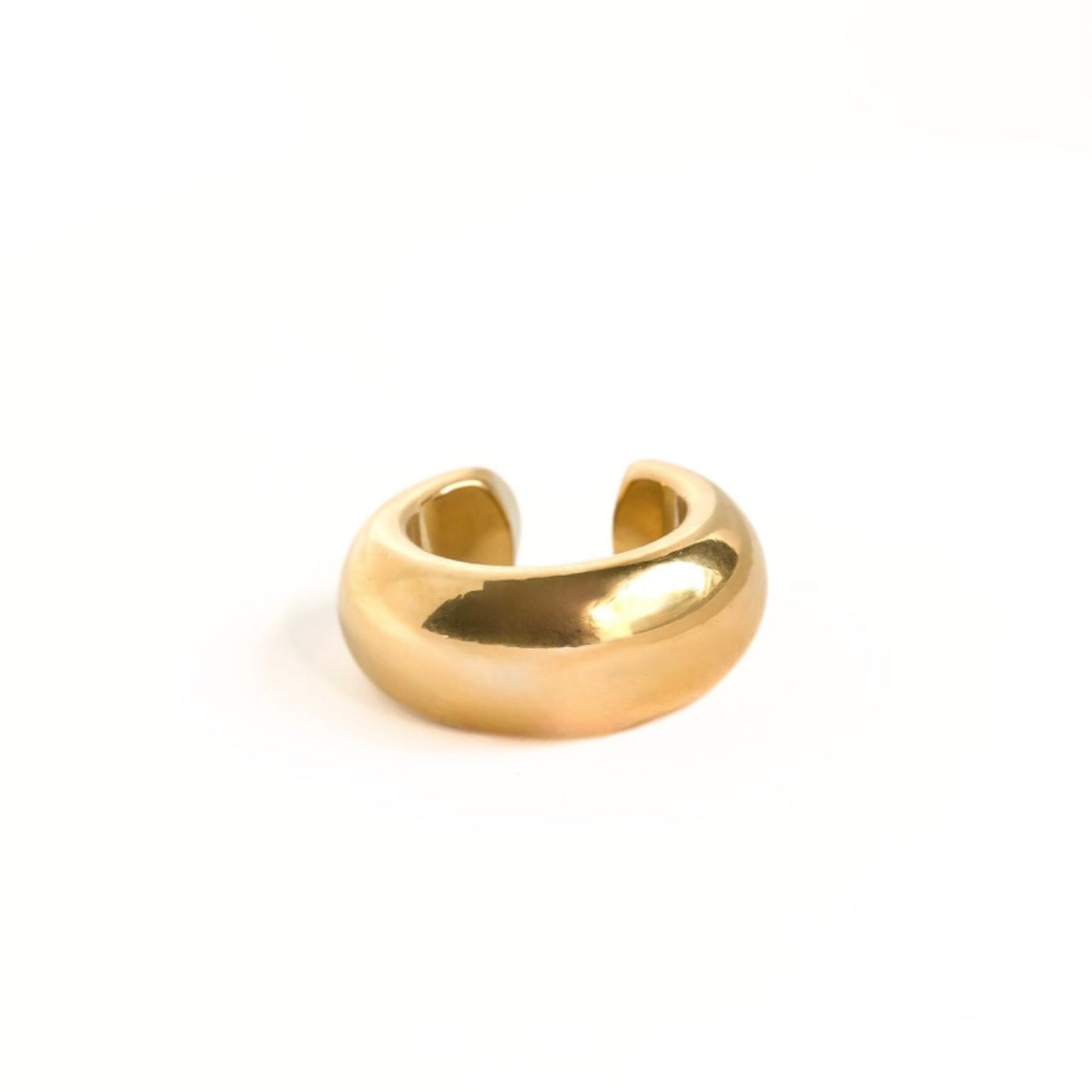 Thick gold ear cuff for conch on a white background