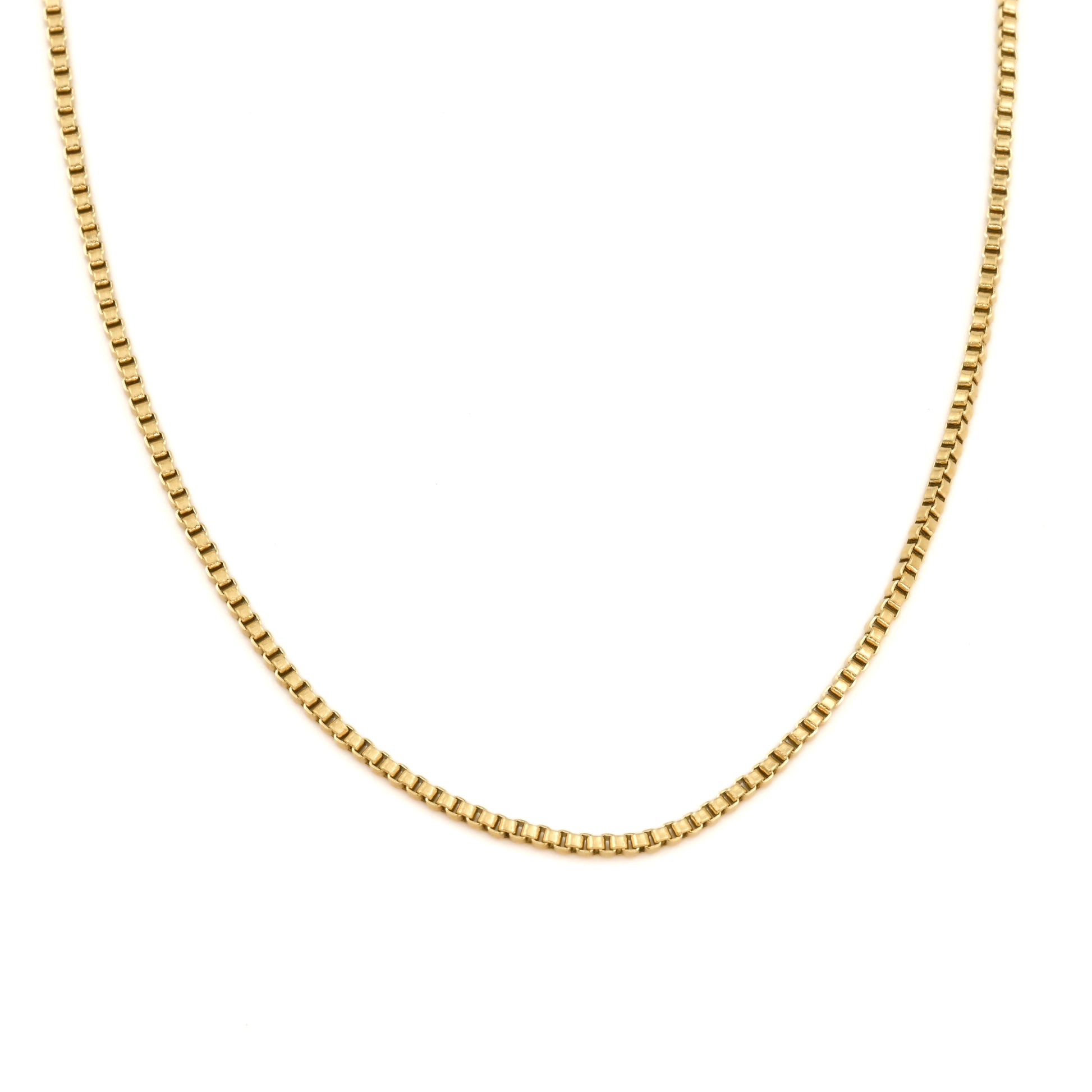 Gold box chain on a white background