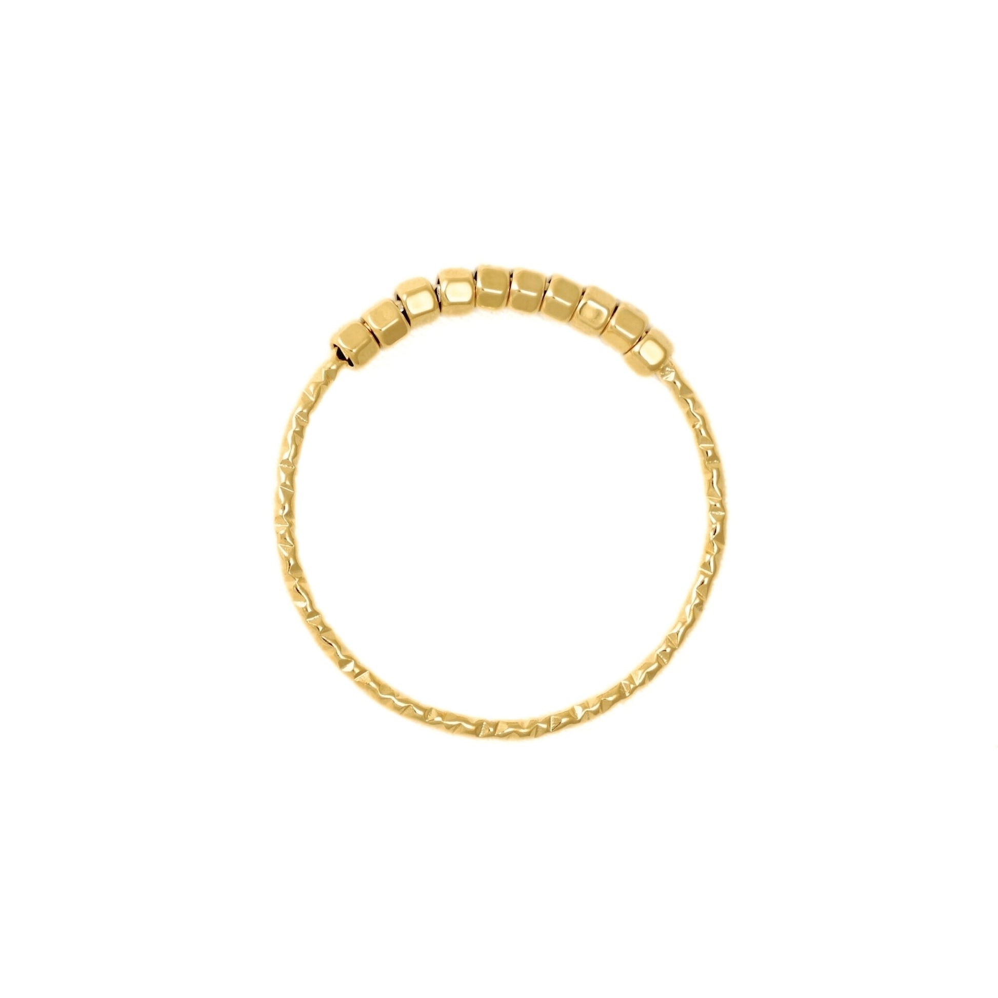 Top voew of a beaded gold ring with a row of faceted square beads on the front side, shown against a plain white background.