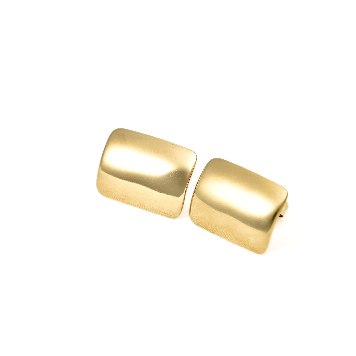 A pair of gold-toned rectangular stud earrings with rounded corners, displayed on a clean white background.