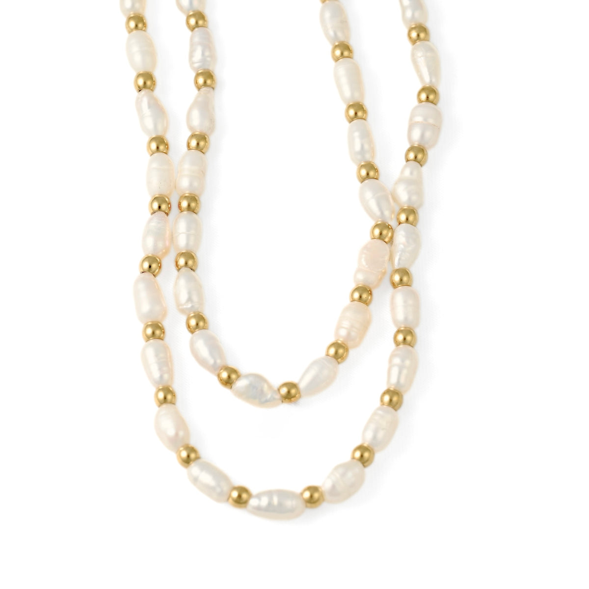 A double-strand pearl necklace with small gold spacer beads, displayed on a clean white background.