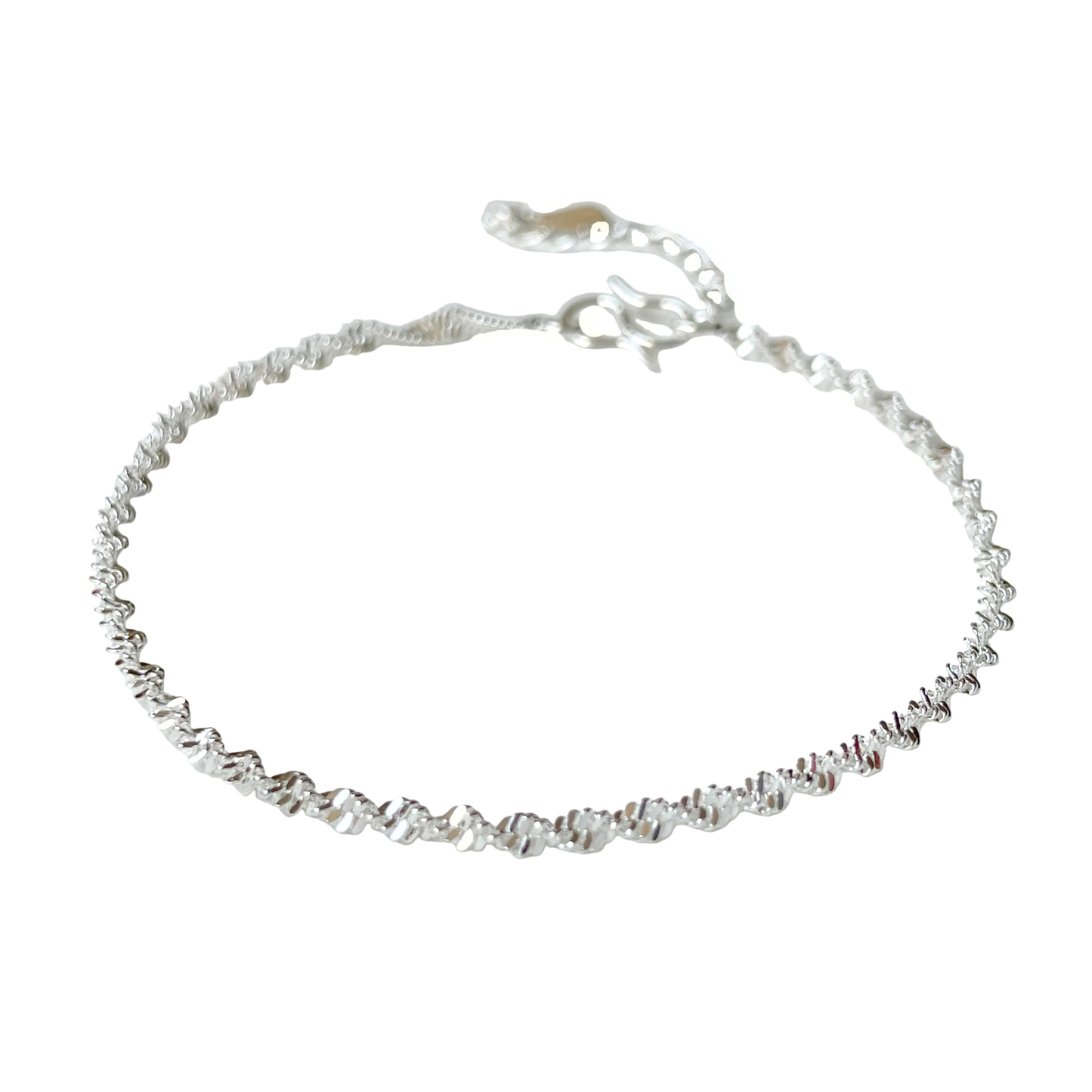 Silver chain bracelet on a white background