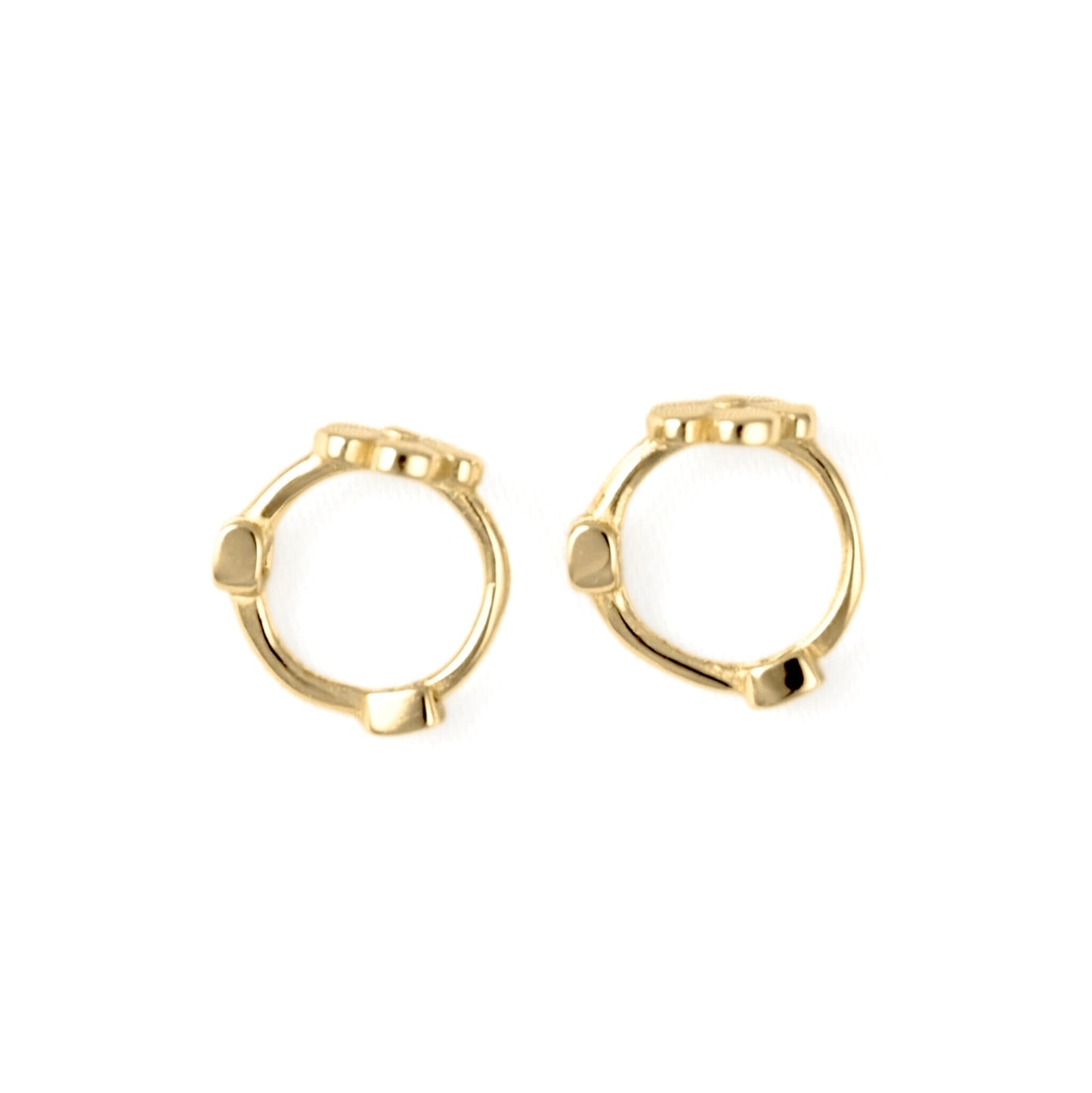 A pair of small gold huggie hoop earrings with textured, raised segments along the front, shown on a plain white background.