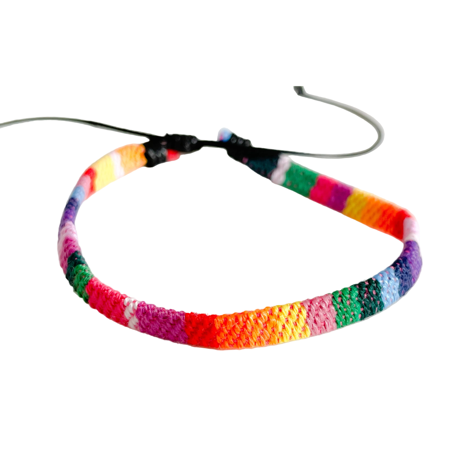Multicolored braided ankle bracelet on a white background